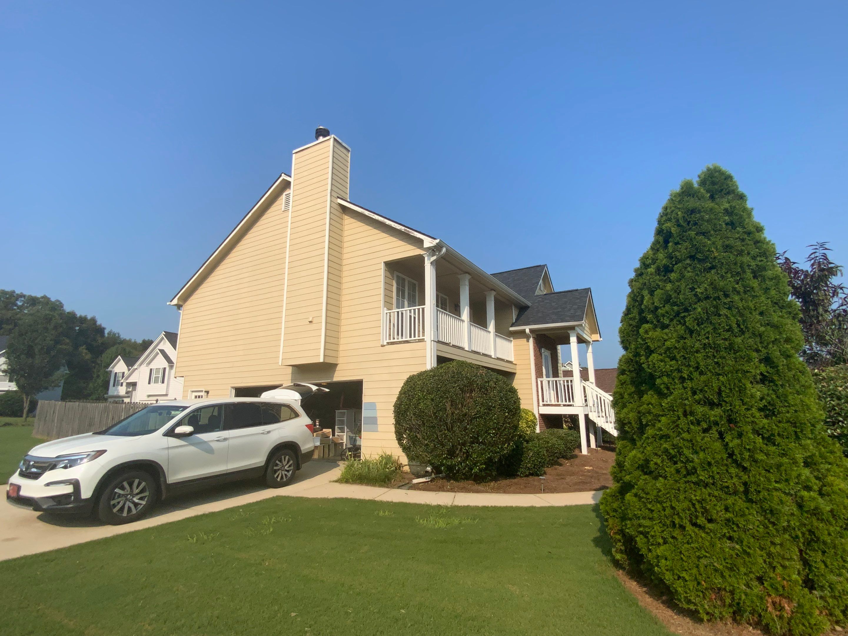 Comprehensive Exterior Painting for Cartersville Home with Blue Siding Transformation by Swift Home Renovations