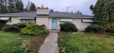 Residential Asphalt Shingle Roof Replacement and Skylight Installation in Spokane