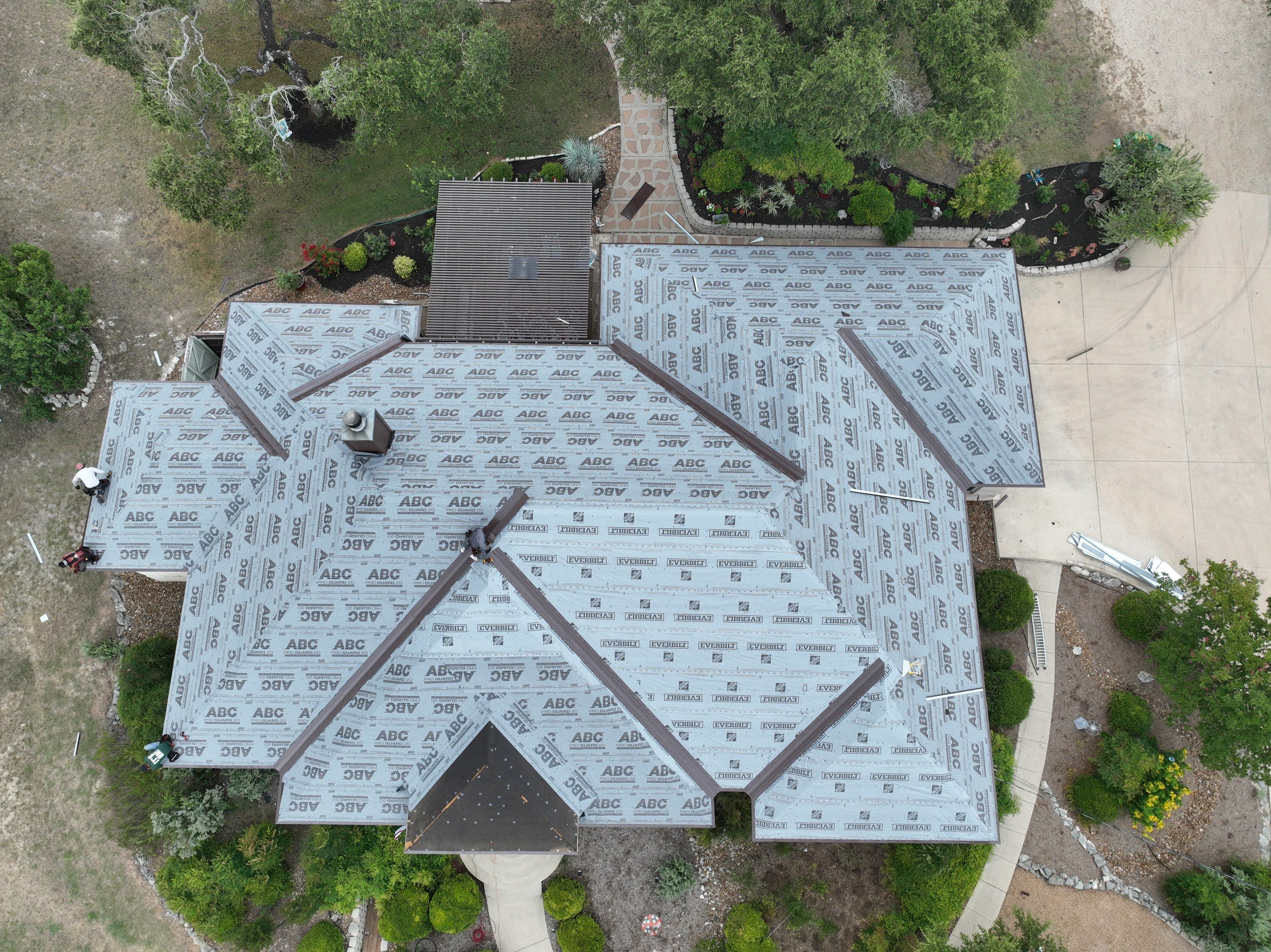 Residential Metal Roof Installation using McElroy Metal by Premier Roofing and Contracting