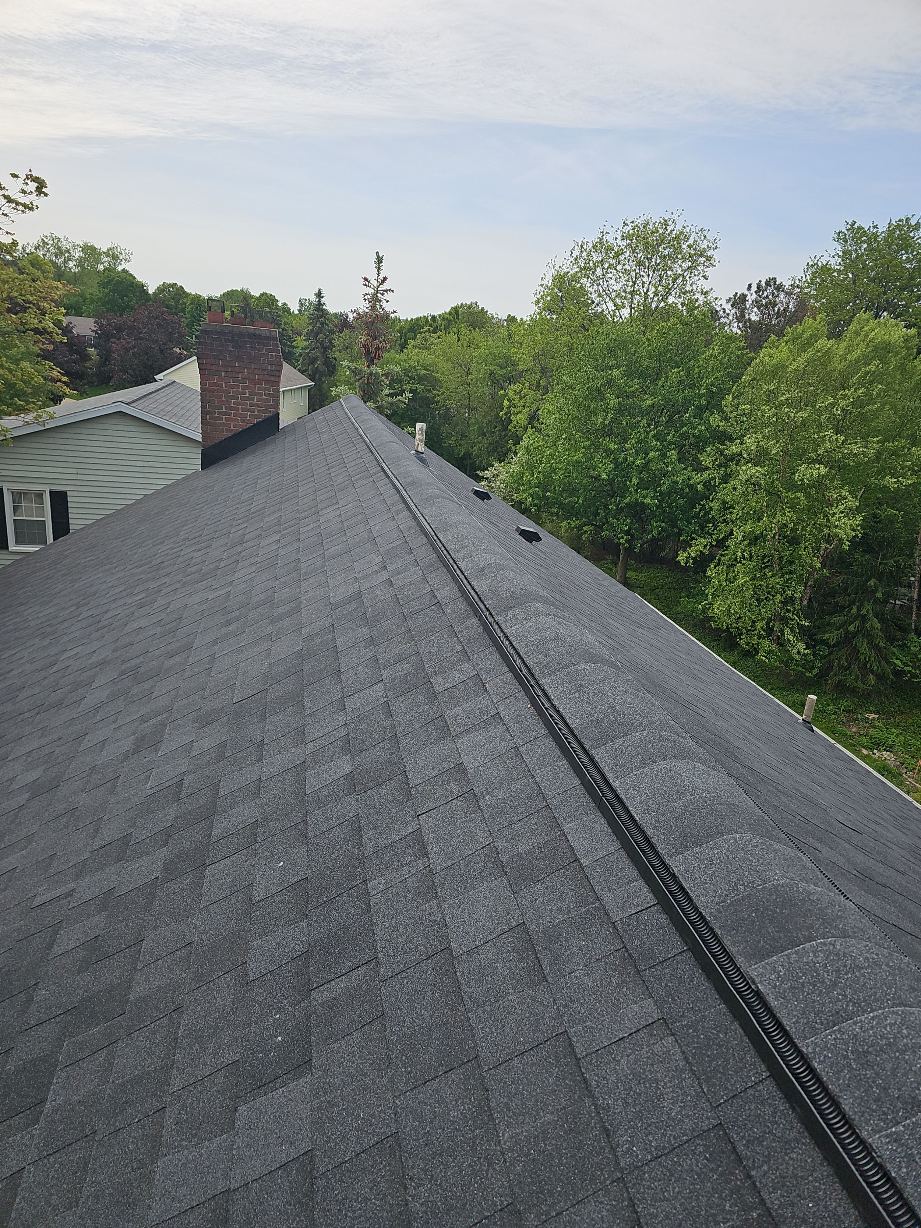 2251 Mission Hills Drive Southeast Grand Rapids, MI 49546 by Veteran Roofing & Exteriors