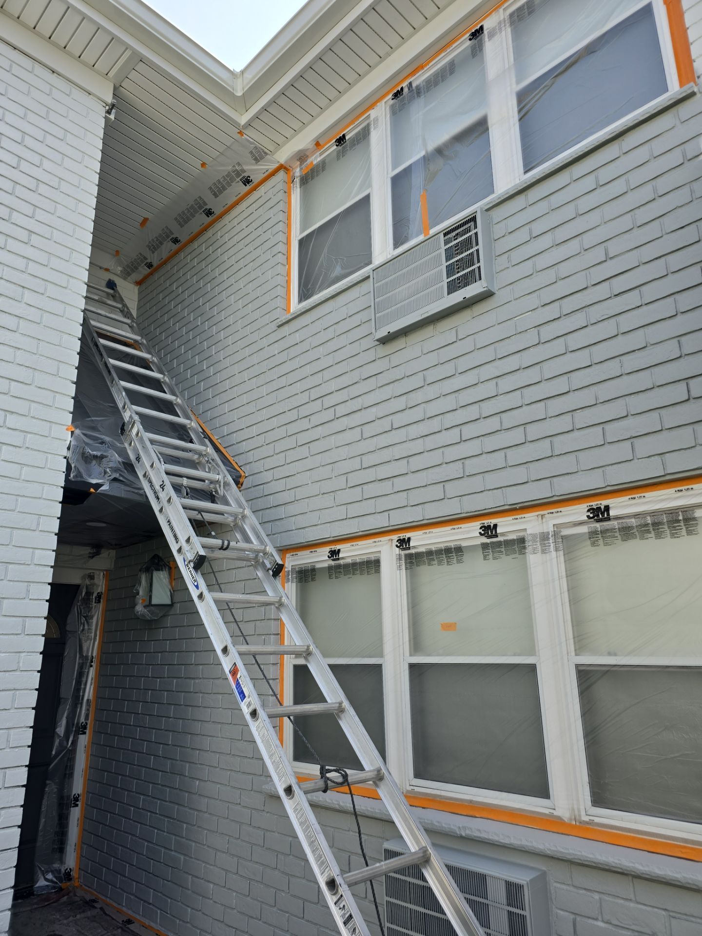Multi-Unit Apartment Complex Exterior Brick Painting Project in Hackensack by Spectrum Painting, LLC