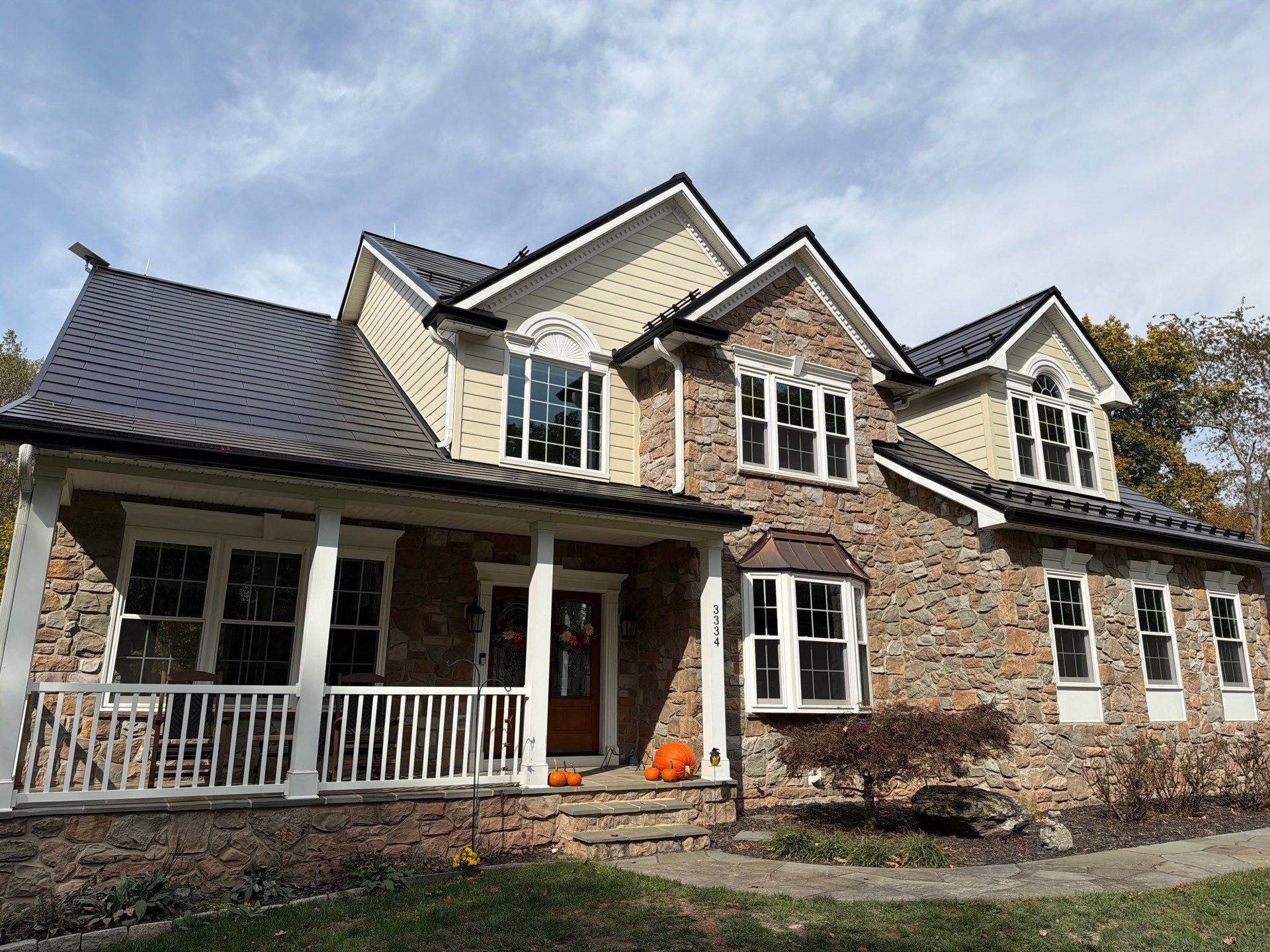 Beautiful James Hardie Siding & Tesla Solar Roof by American Home Contractors