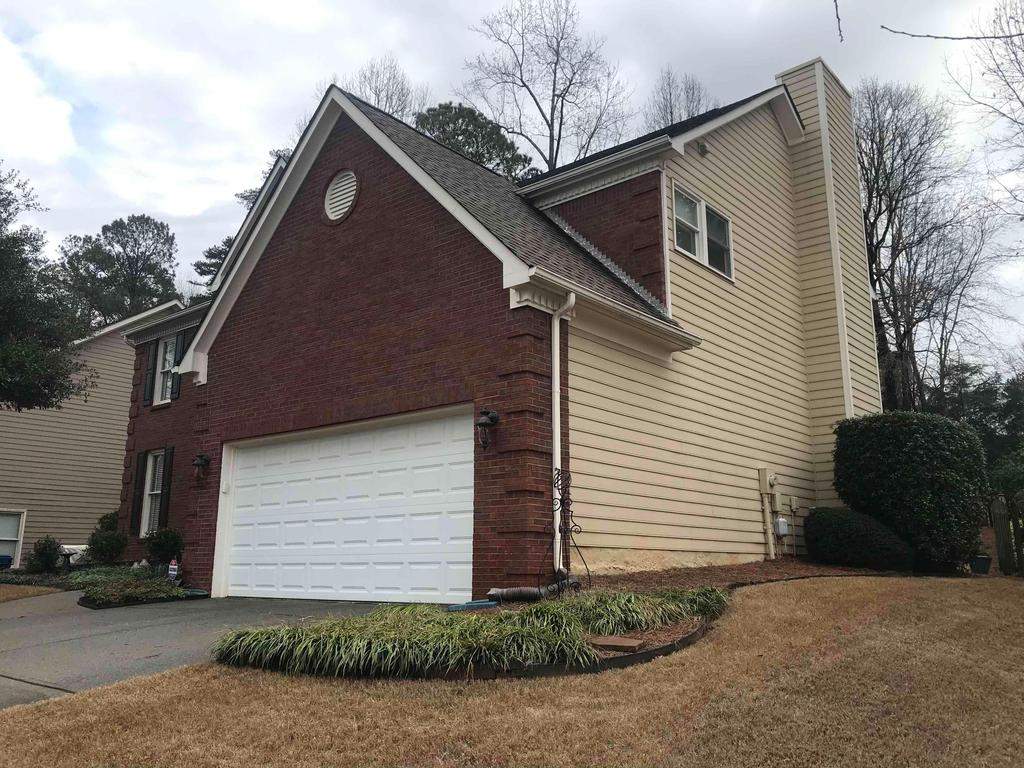 Exterior Painting, James Hardie Siding Install, and Gutter Replacement in Alpharetta, GA - After Results Taken Six Years After Painted by Nelson Exteriors