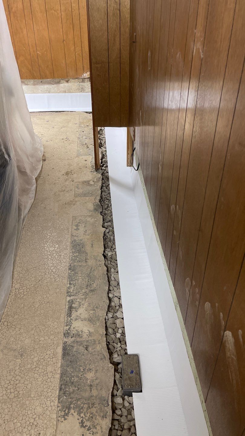 Interior Waterproofing Using GrateDrain™ Products by Toledo Basement Repair