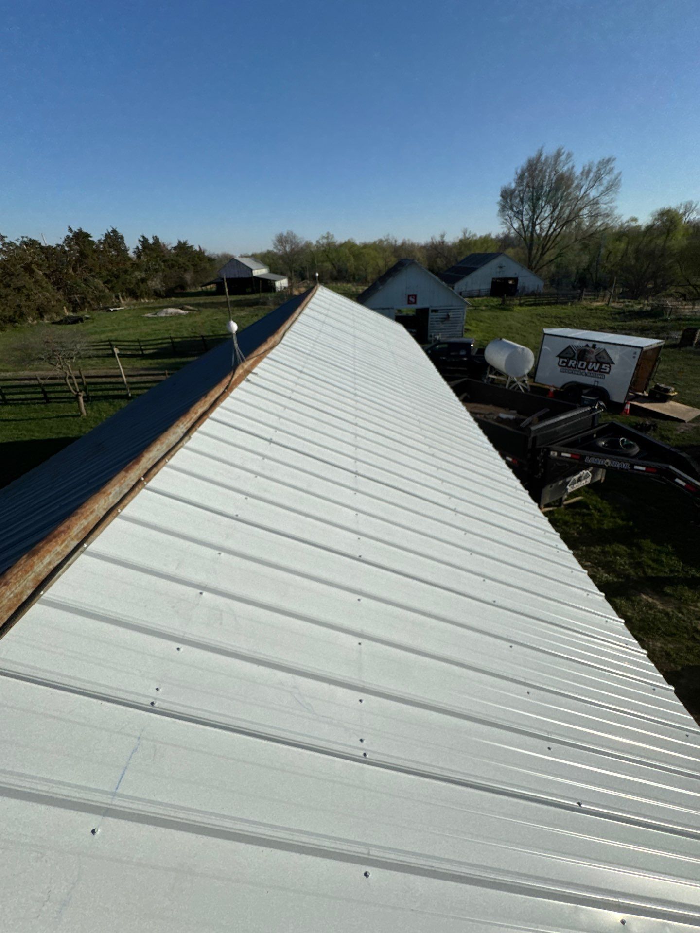 Ribbed Metal Roof Replacement on Outbuilding in Hooper, NE by Crows Roofing LLC