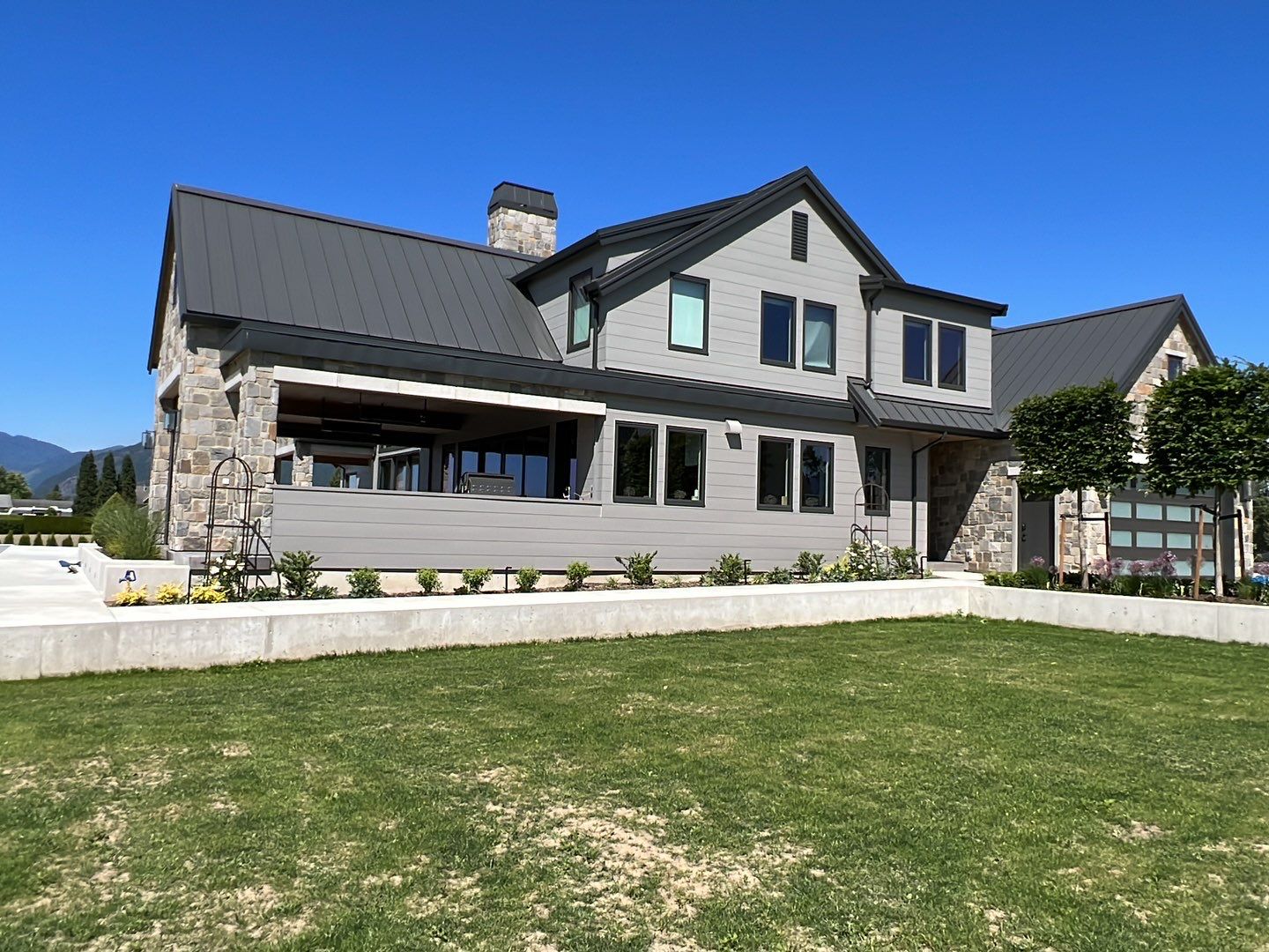Residential Roofing Installation using 12" Prolok metal  by Top Notch Roofing Inc