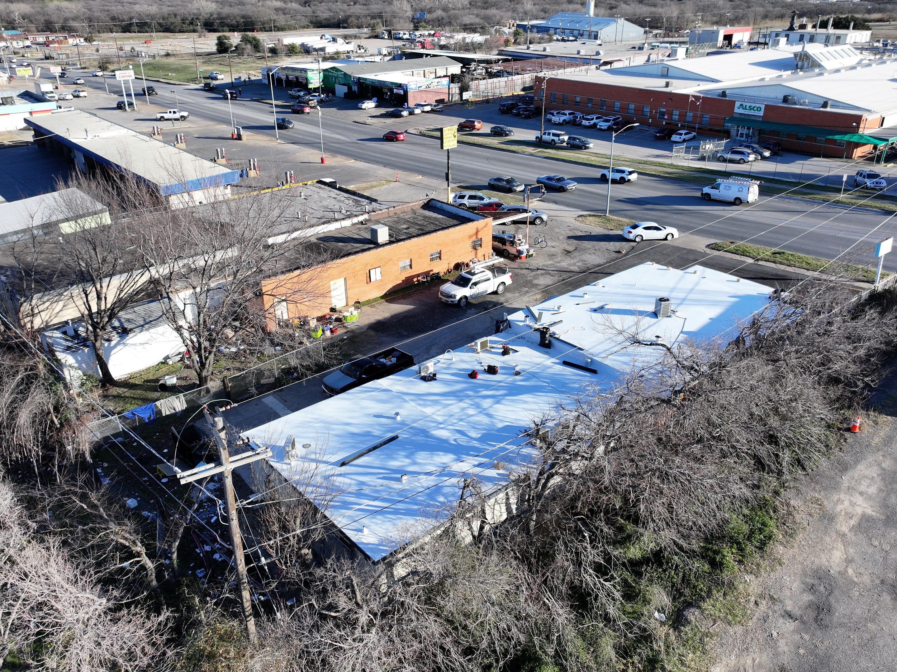 Commercial roofing overlay using GAF TPO over an old ballast roof by Becker Roofing and Exteriors
