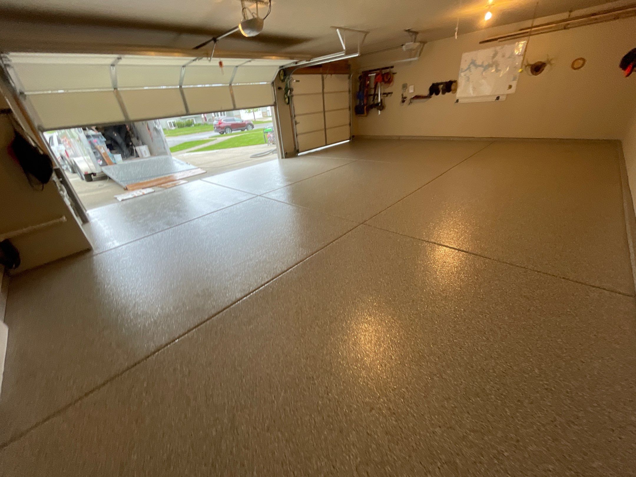 Garage Transformation using Pebble Beach and Front Porch using Greystone by Croc Coatings, LLC
