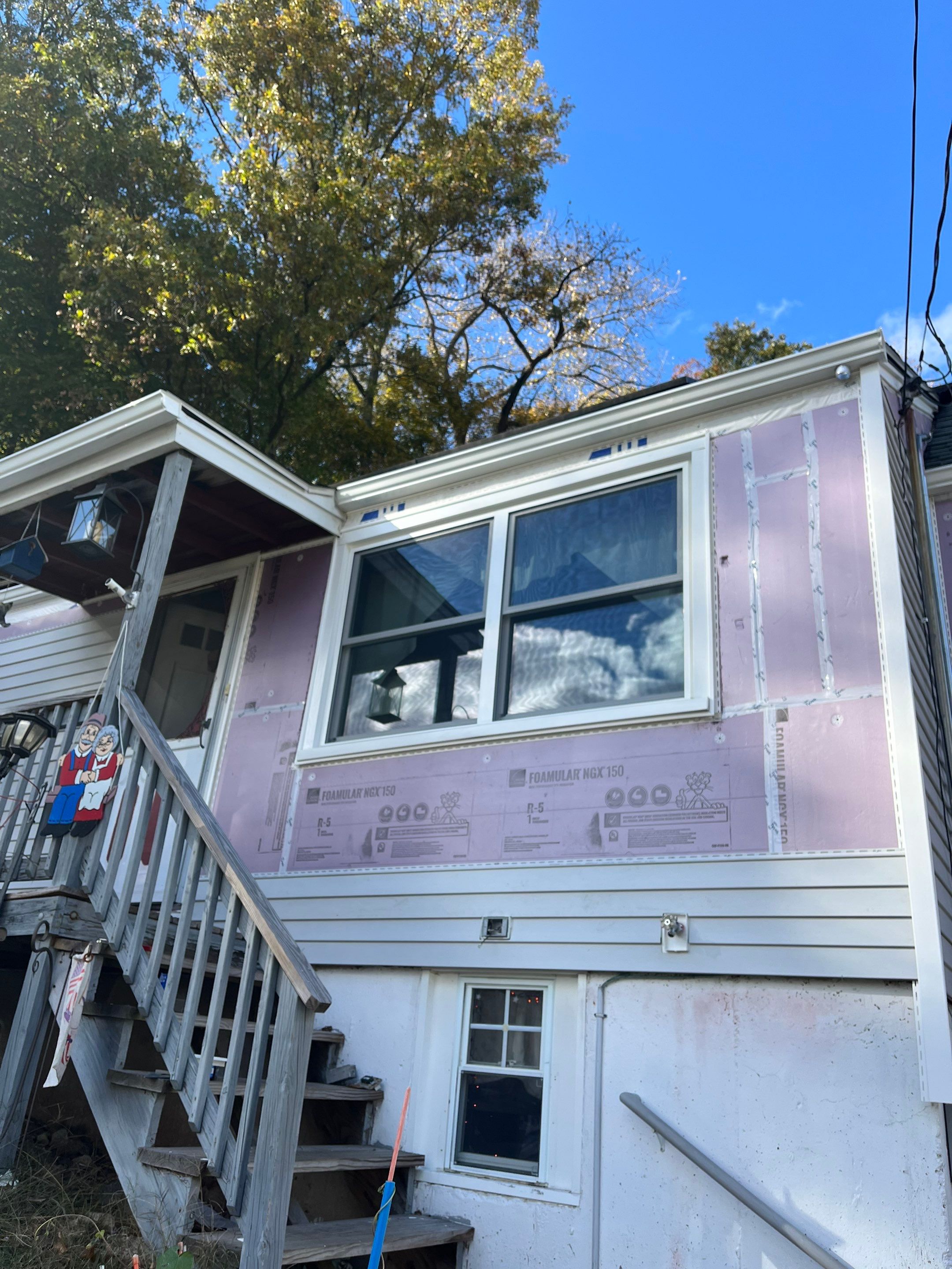 New Siding & Partial Chimney Rebuild by Regal Renovations