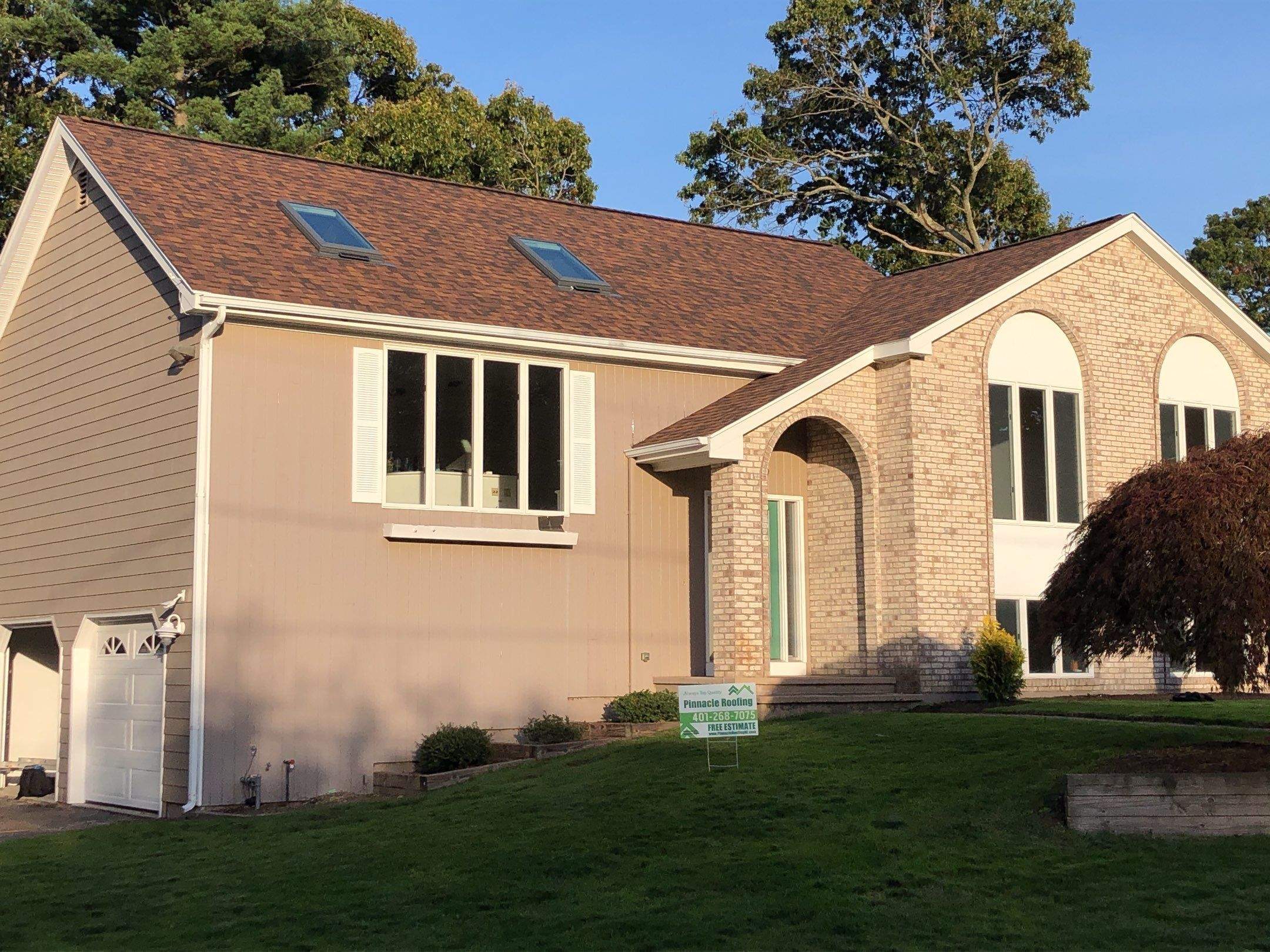 Burnt Sienna Roofs by Pinnacle Roofing & Skylights