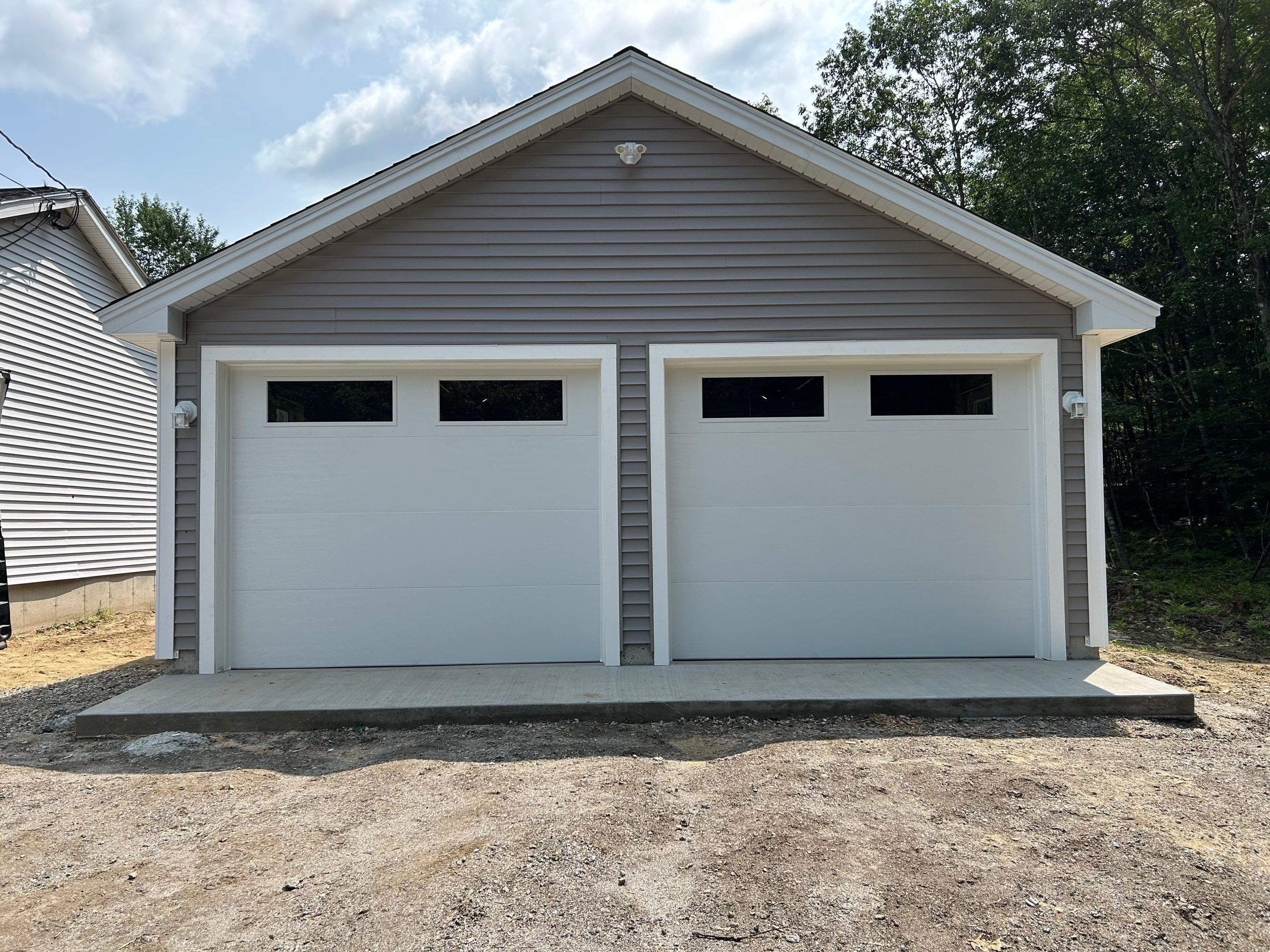 Door Installation using Clopay Modern Steel Garage Doors by Keene Door