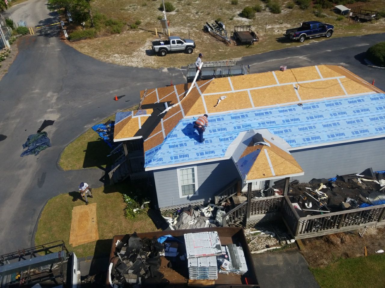 Residential Roofing Installation using Roof Replacement by American Roofing & Construction LLC