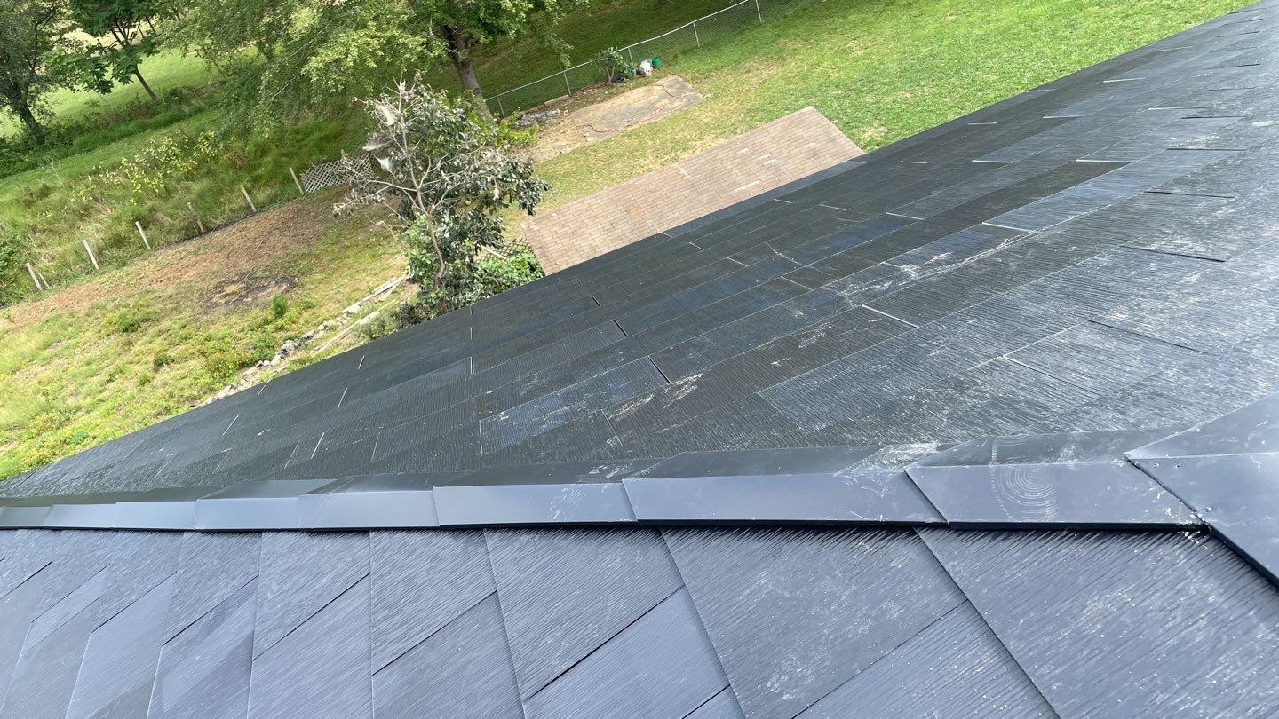 Tesla Solar Roof  using Tesla Solar Roof V3 tiles by American Home Contractors