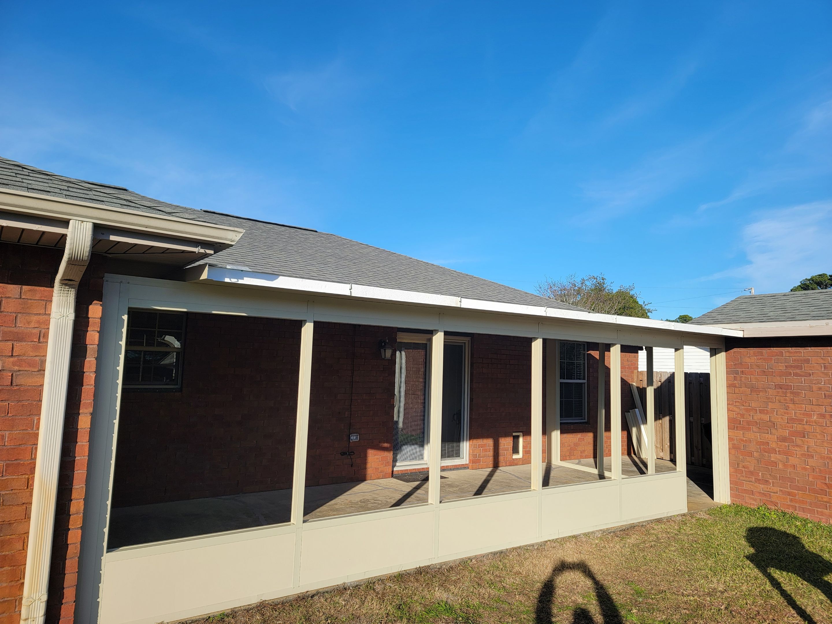 Enclosure w/Vinyl Windows using Colorbeam by Titan Sunrooms