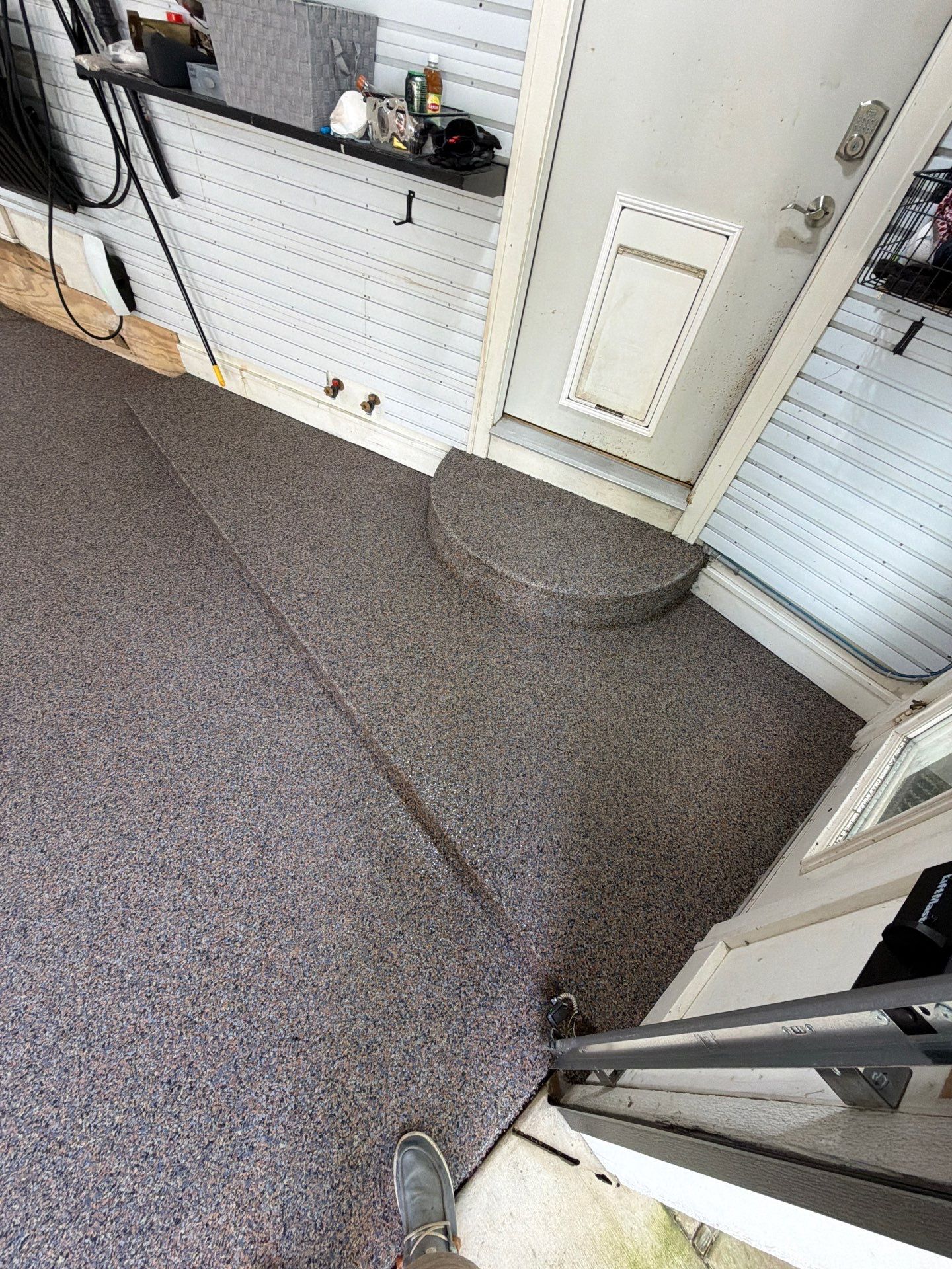 Residential Garage Epoxy Flake Floor Installation in Grand Haven by Gordon Painting