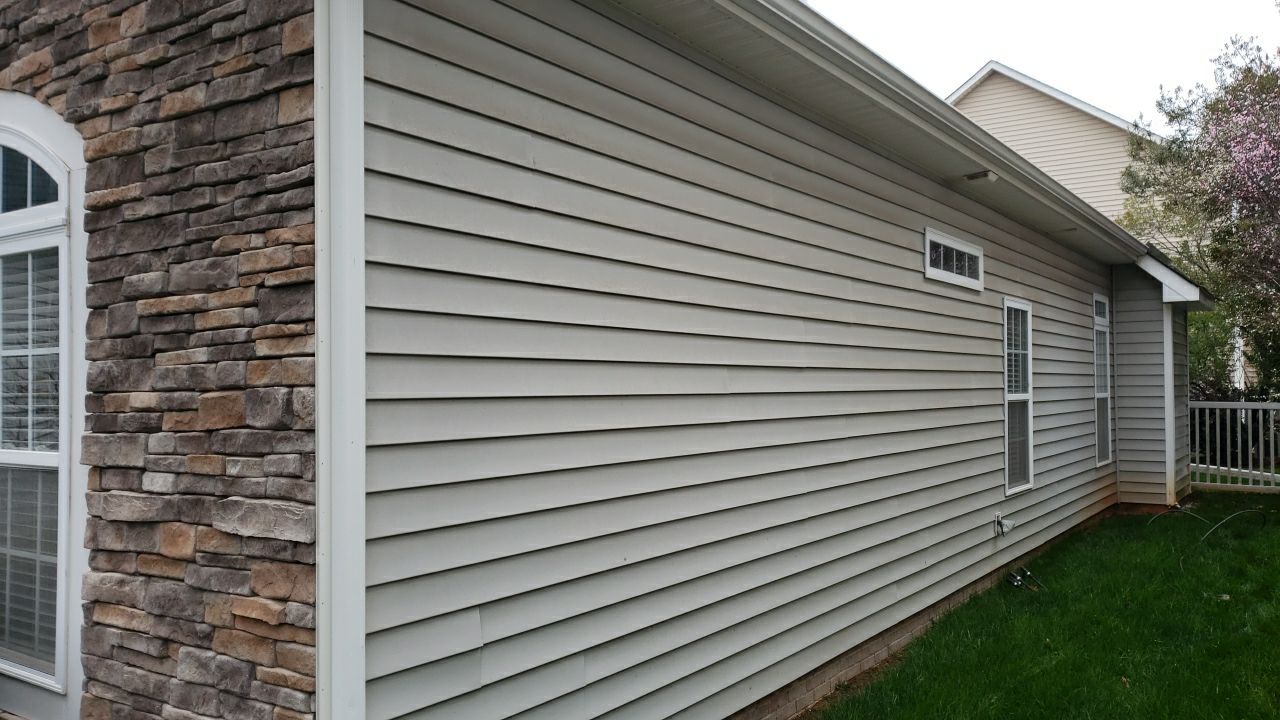 House Wash using cleaner by Power Wash Masters LLC