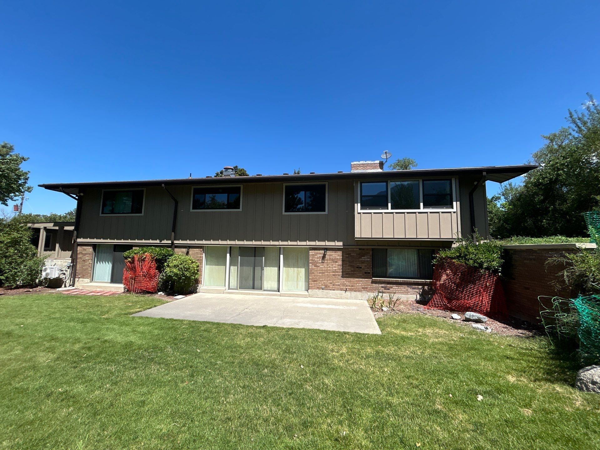 Complete Hardie Colorplus Board and Batten replacement with Custom Soffit Transformation in Sandy by Ideal Siding Utah
