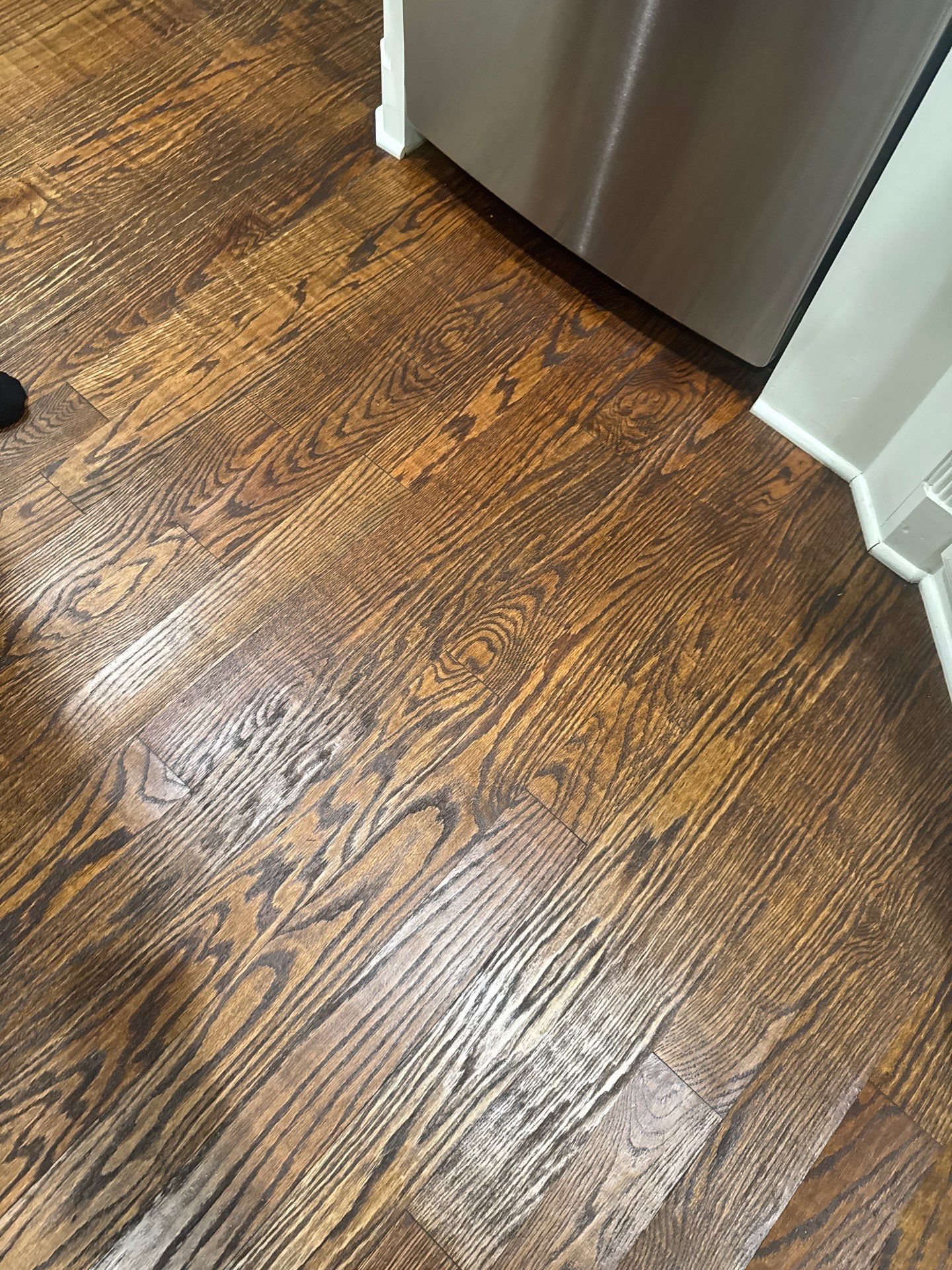 Dishwasher Flood Repair by Fine Line Flooring Inc.