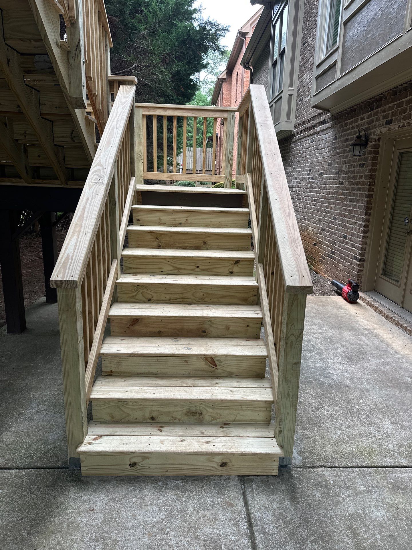 Decatur, GA Deck Resurface and Privacy Wall Build Using Pressure Treated Pine by Nelson Exteriors 