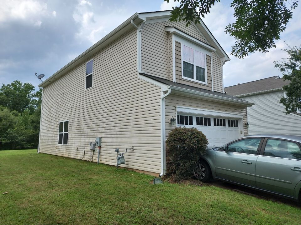 House Wash using cleaner by Power Wash Masters LLC