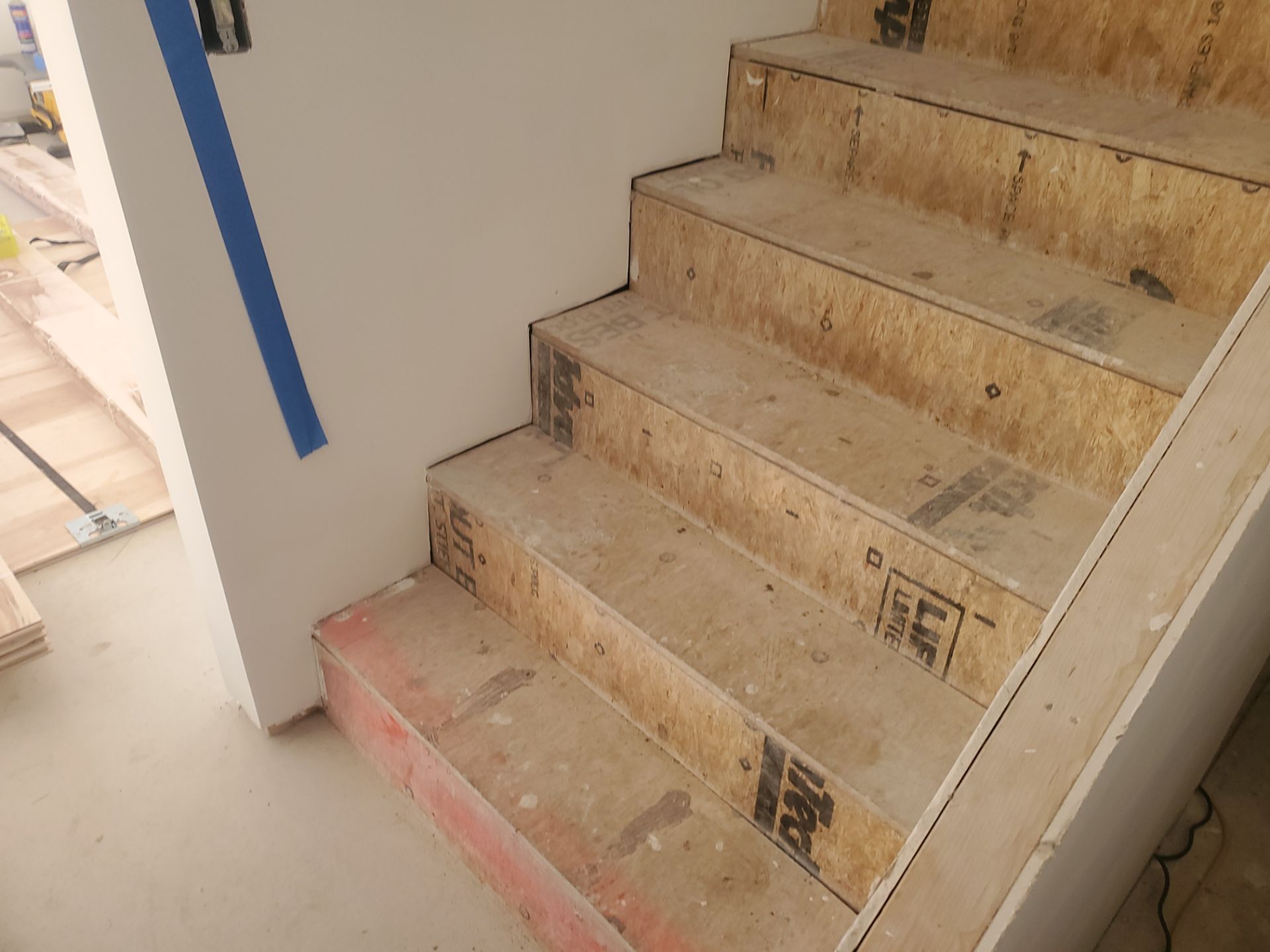 Full glue down Installation over radiant heat 7" Maple character grade by Ann Arbor Hardwoods 