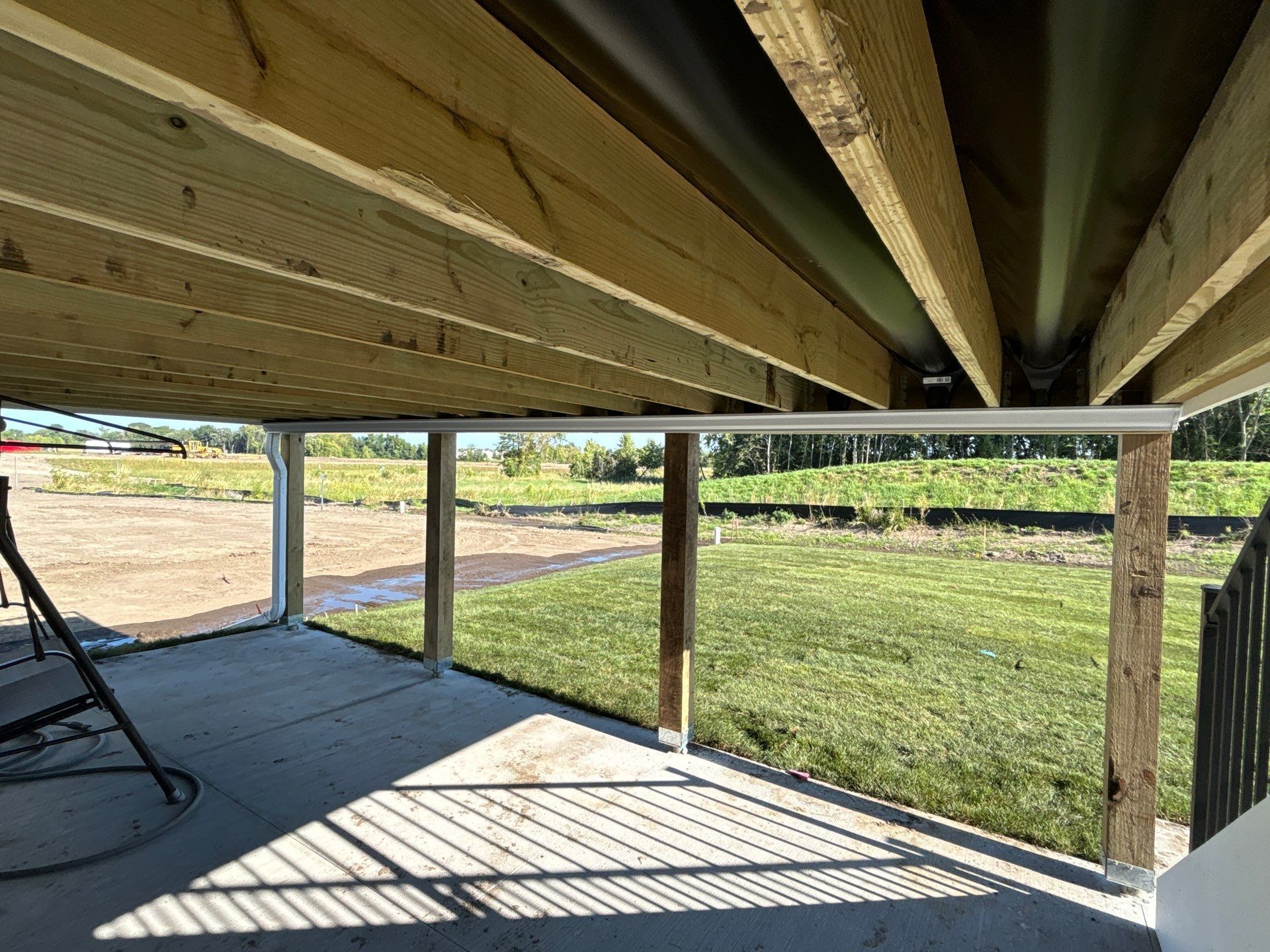Under Deck Gutter System Installed by Next Level Seamless Gutters / Exteriors Inc.