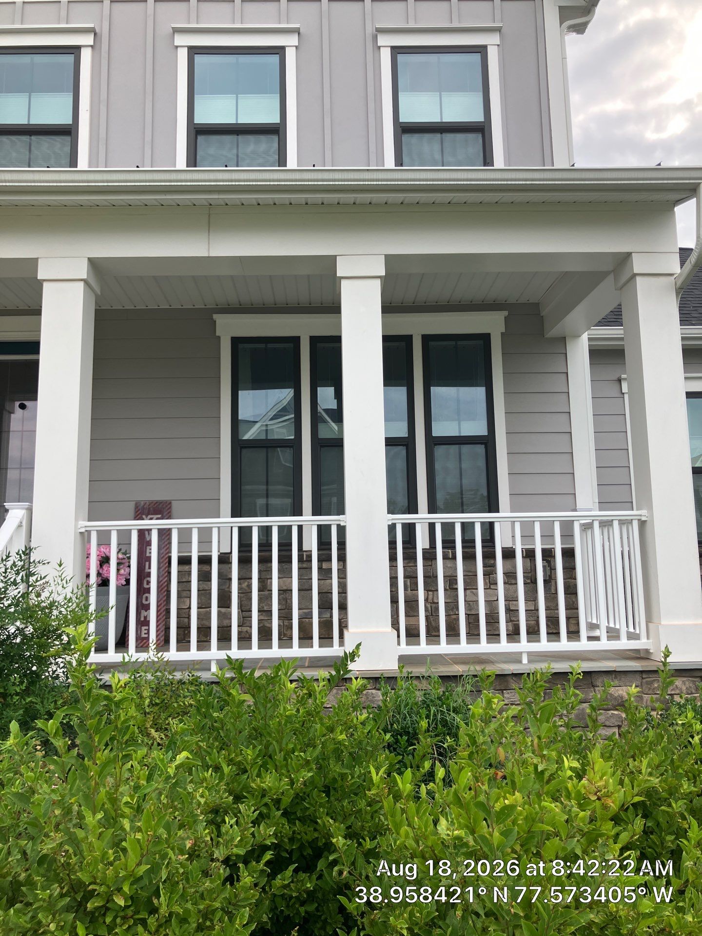 White Front Porch Railing Installation in Stone Ridge by Contracting Bros Llc