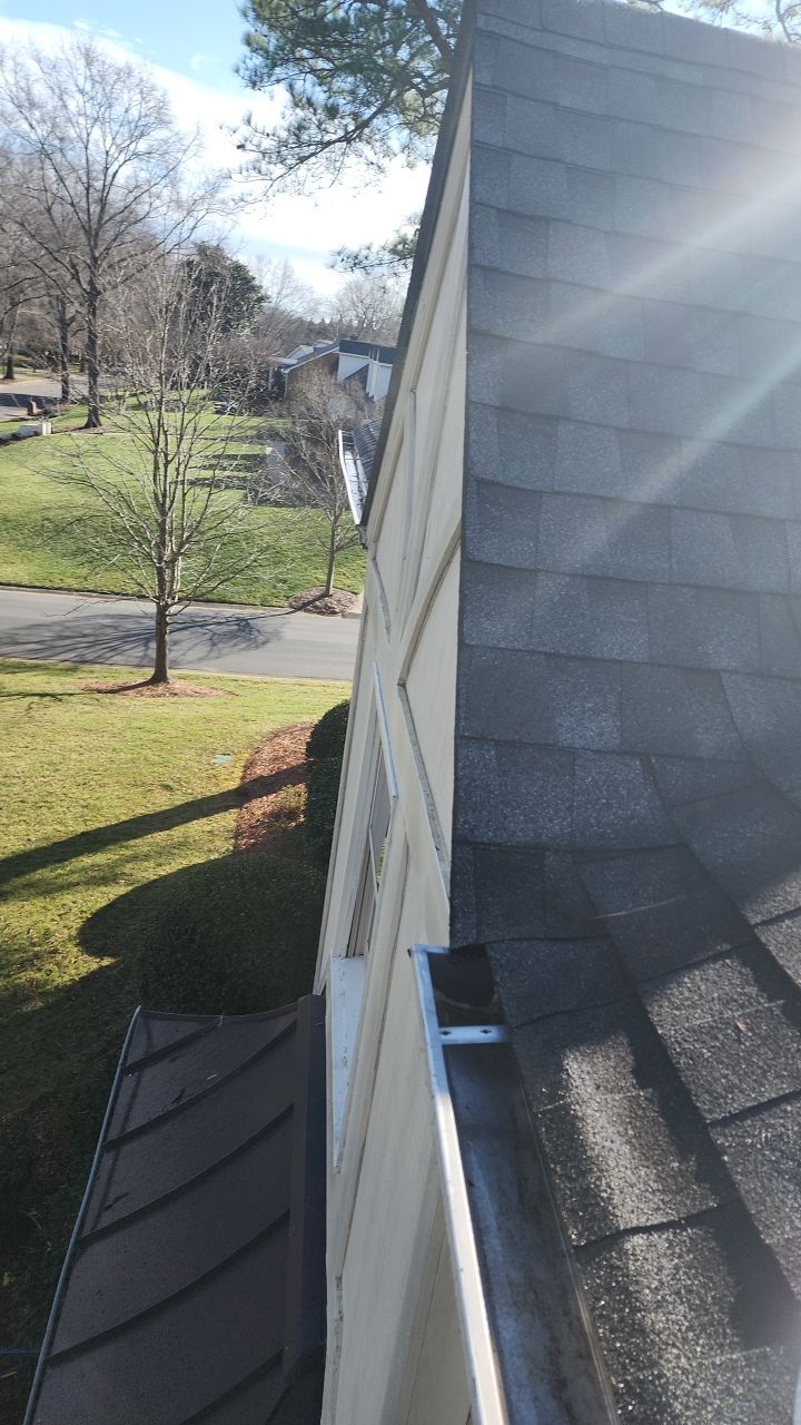 Gutter Cleaning using water by Power Wash Masters LLC