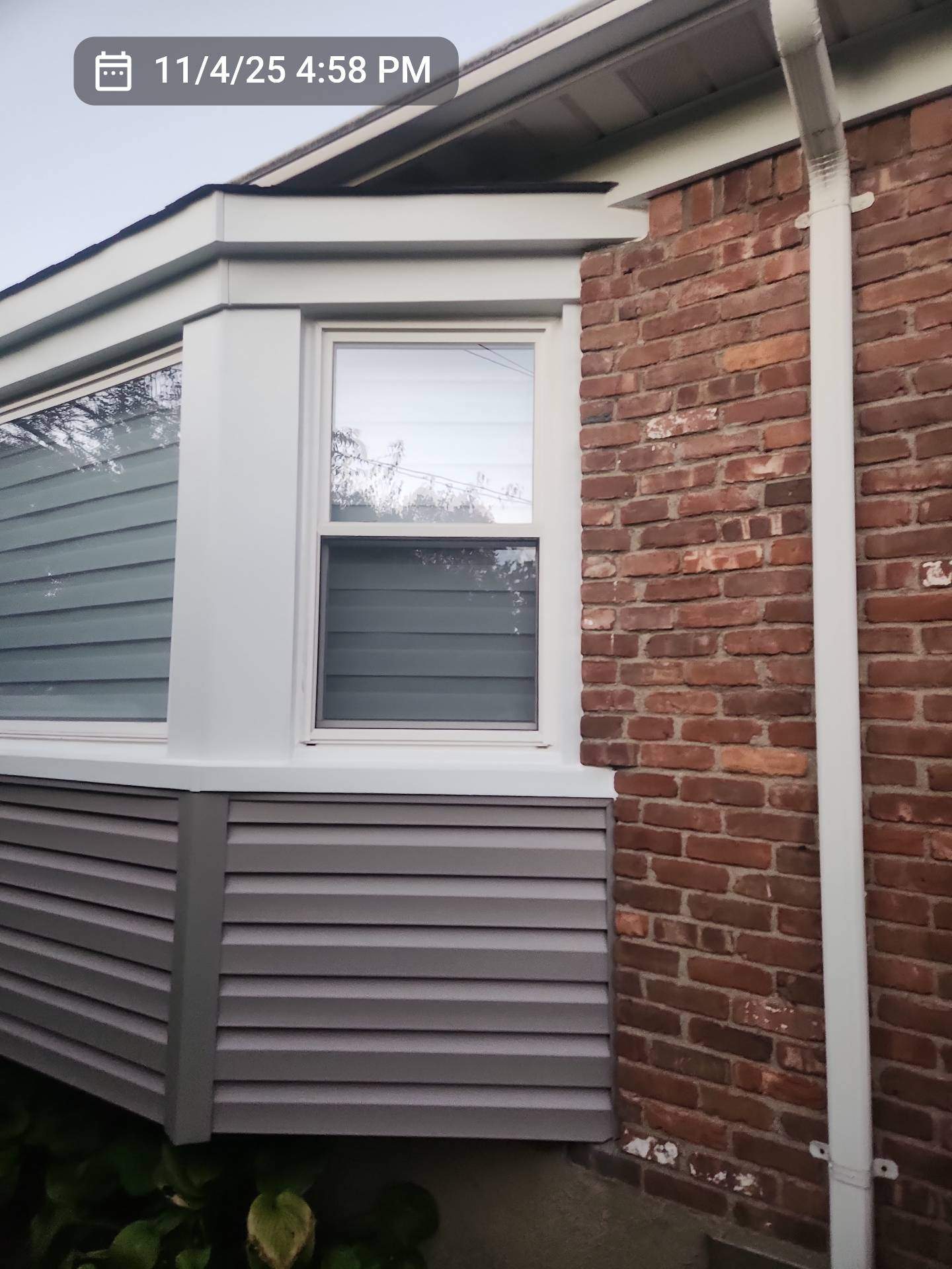 New Siding & Trim by Island Roofing Inc.