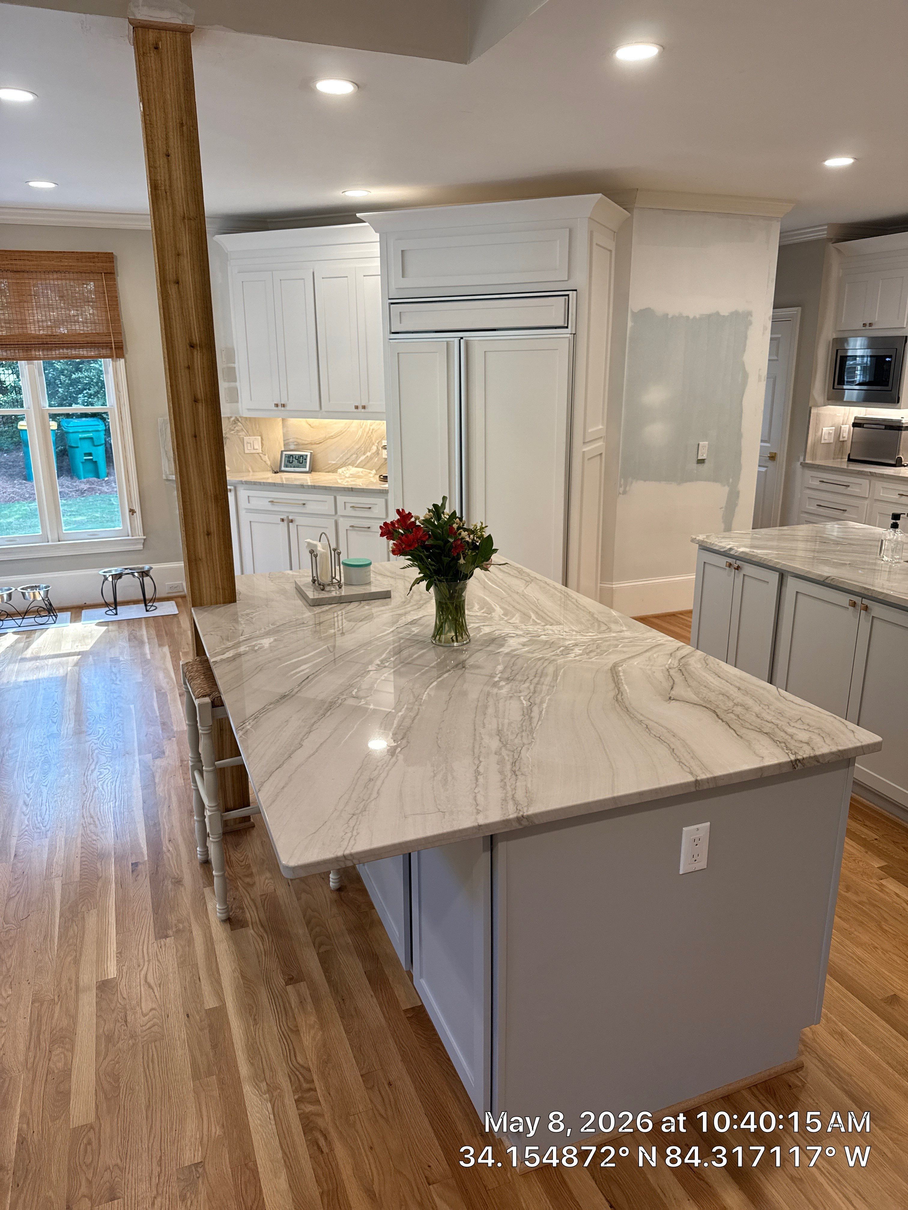 Alpharetta Kitchen Remodel Featuring Double Islands and White Quartz by Heart & Home Kitchen & Bath Remodeling LLC