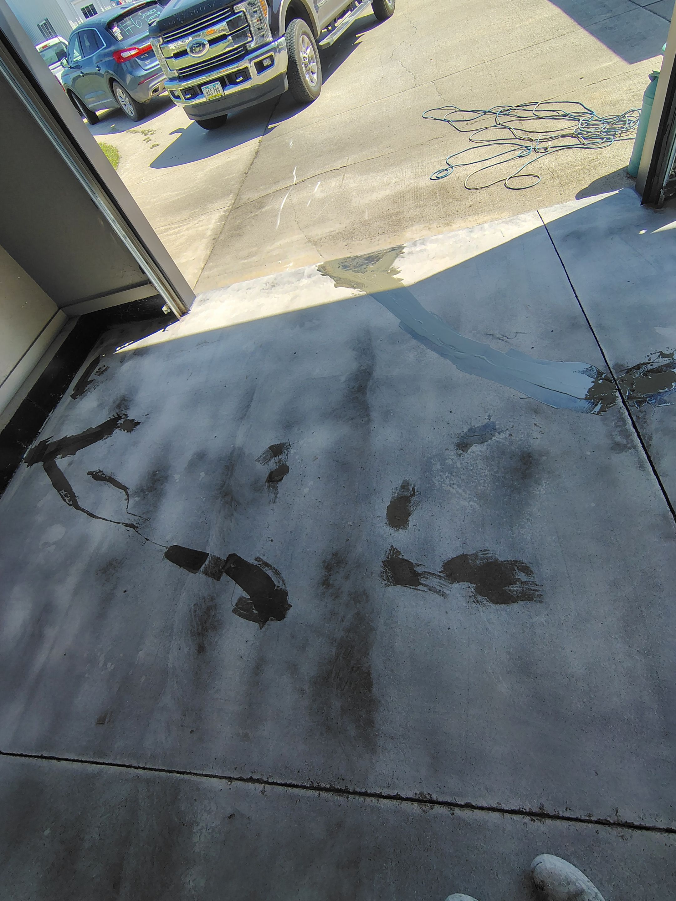 Garage Concrete Floor Coating and Crack Repair in Onawa by Select Painting, Coatings & Garage Cabinets