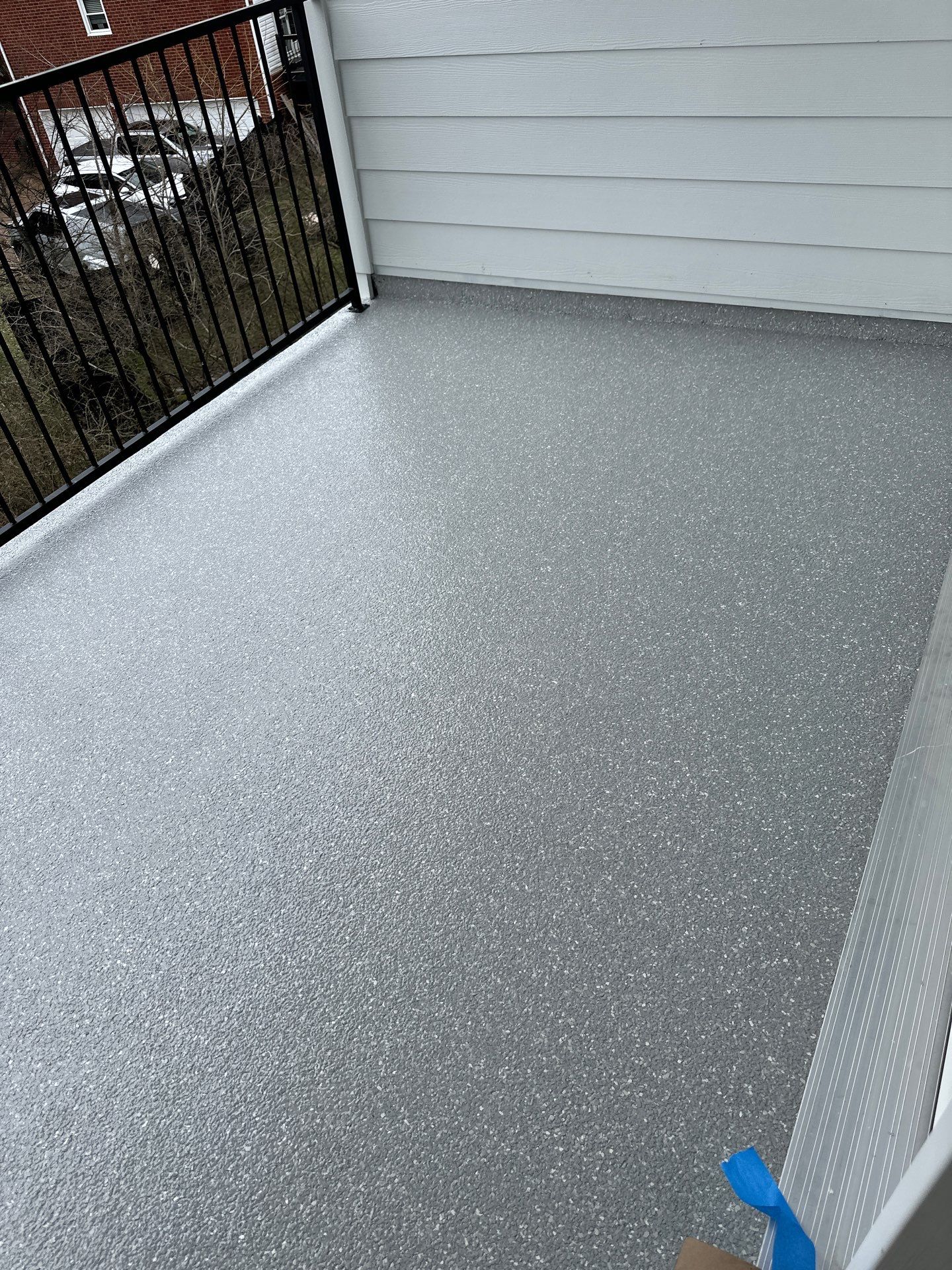 Patio Floor Coating using Custom Color by My Garage Floor Guys