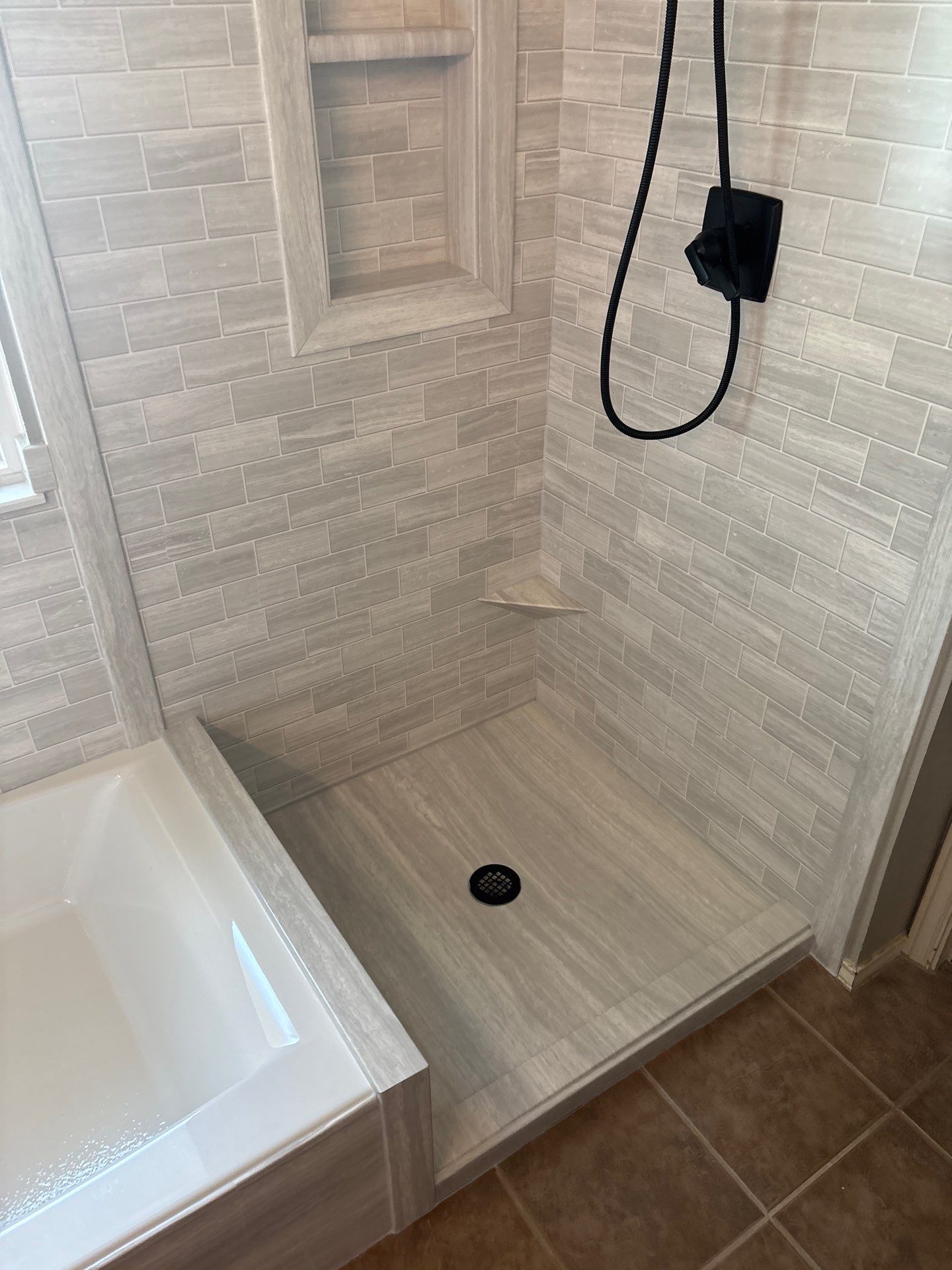 New walk in shower and tub in Kyle by Lane Lauritsen - The Hill Country, Texas