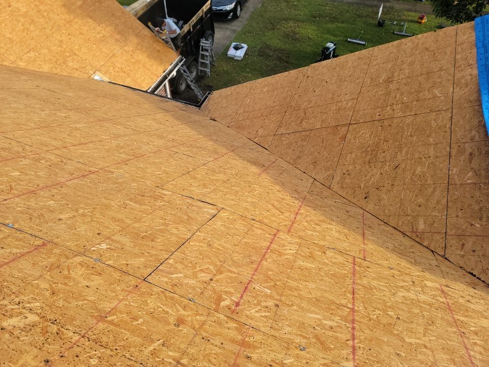 Residential Roofing Installation using Roof Replacement by American Roofing & Construction LLC