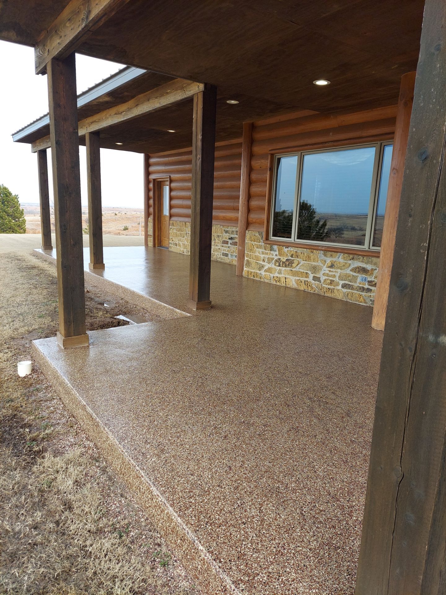 Patio Coating Installation with Chestnut by Copperhead Coatings