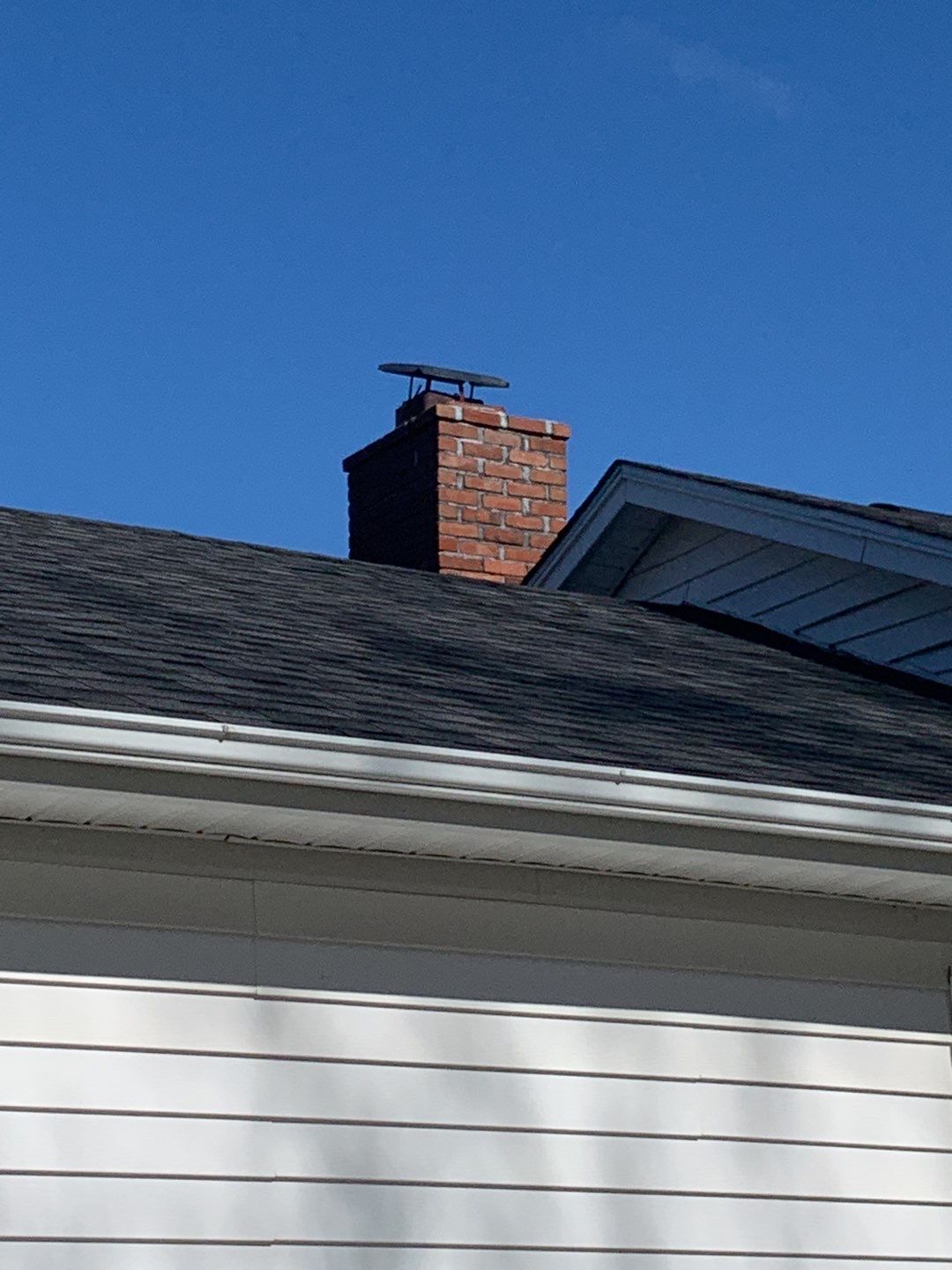 Residential Roofing Repair using Chimney Flashing by A Plus Exterior