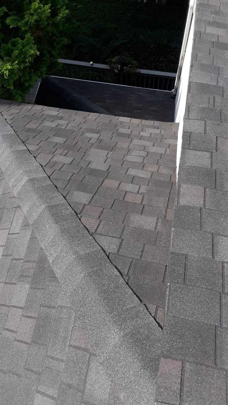 Skylight, Roof, and Gutter Replacement by American Home Contractors