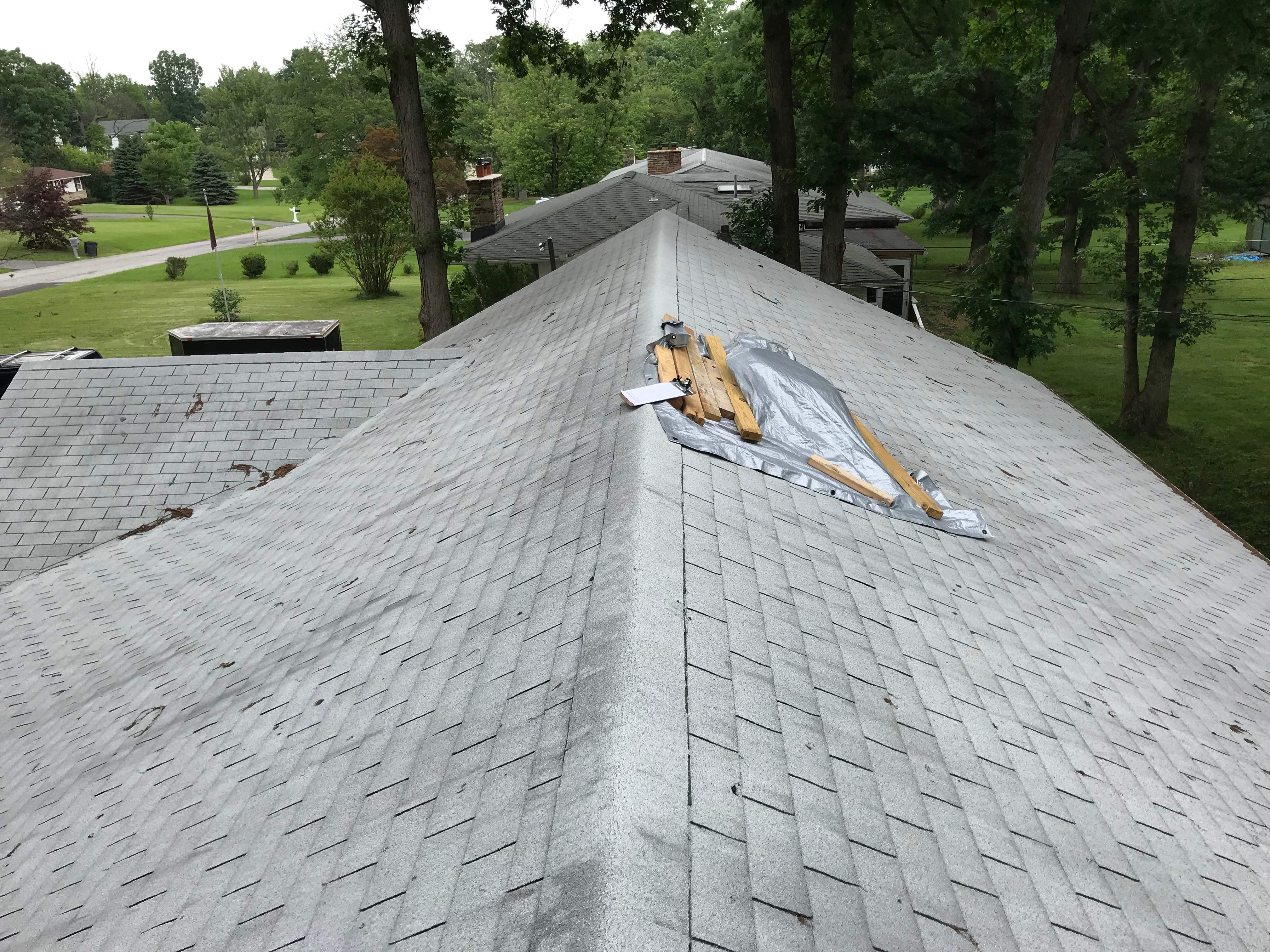 Residential Roofing Installation using Charcoal Black by Alpha Design Services