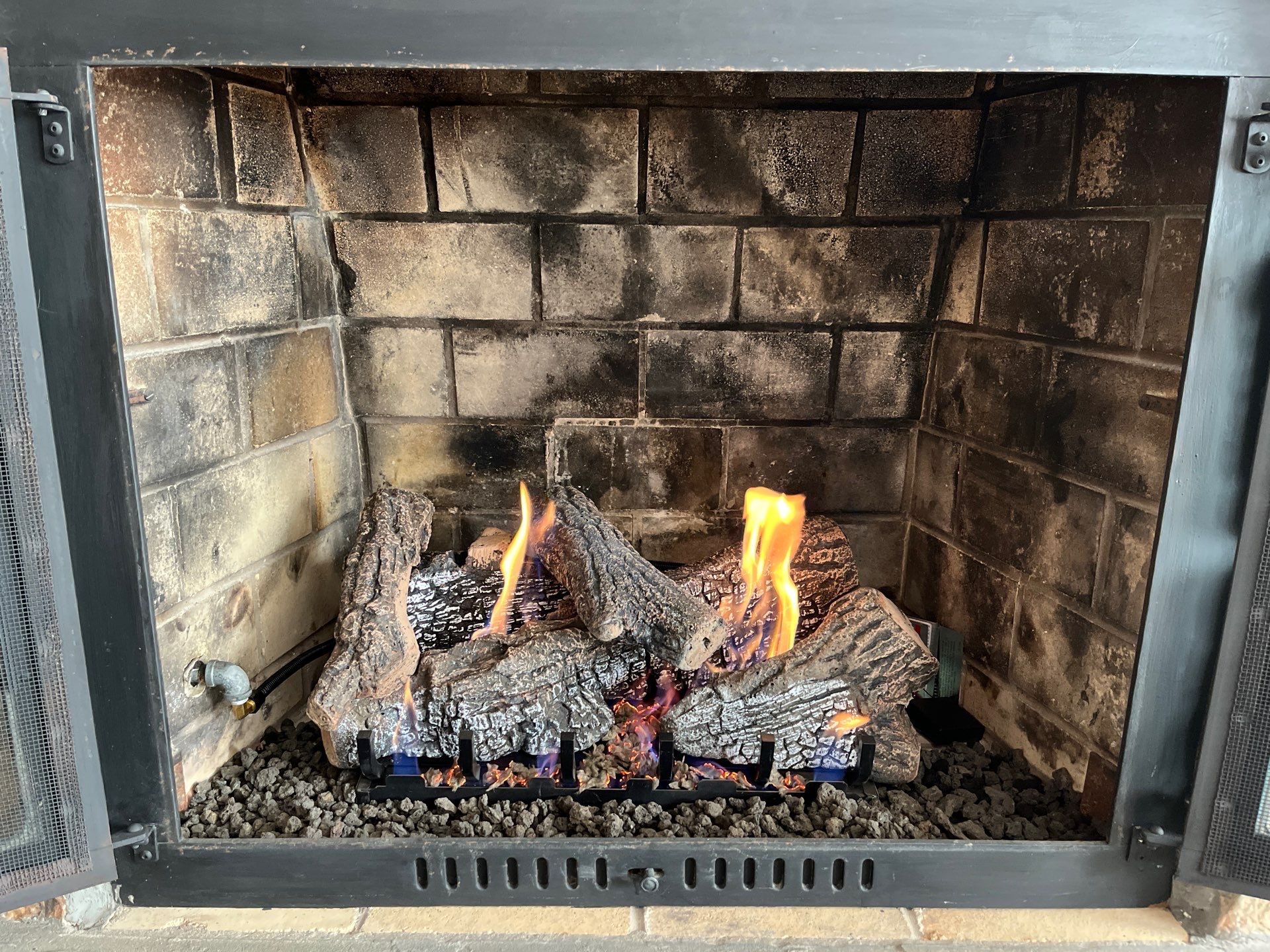 Gas Logs in Hampton by Premier Chimney and Roofing