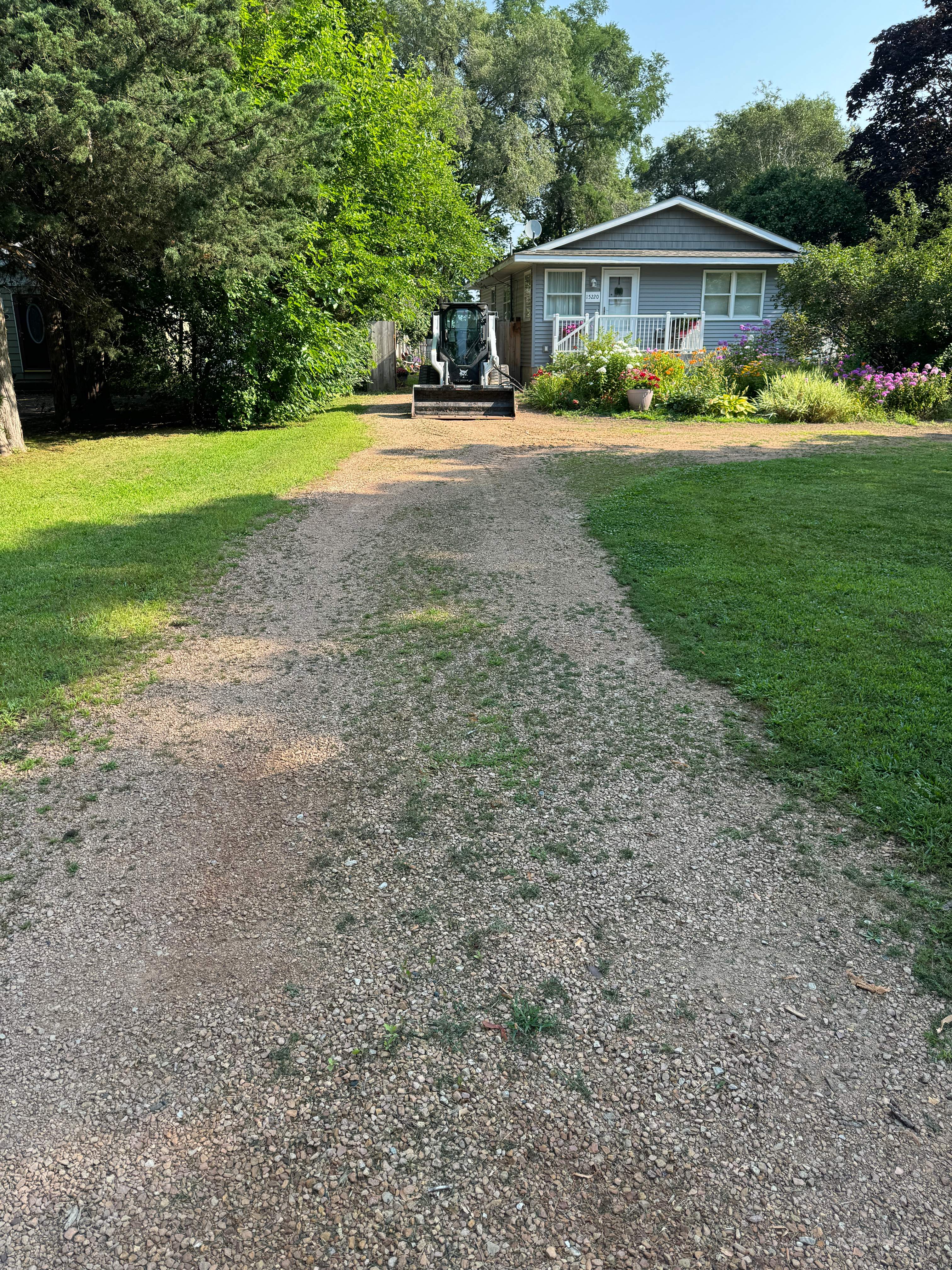 Gravel Driveway Restoration by Sota landscaping