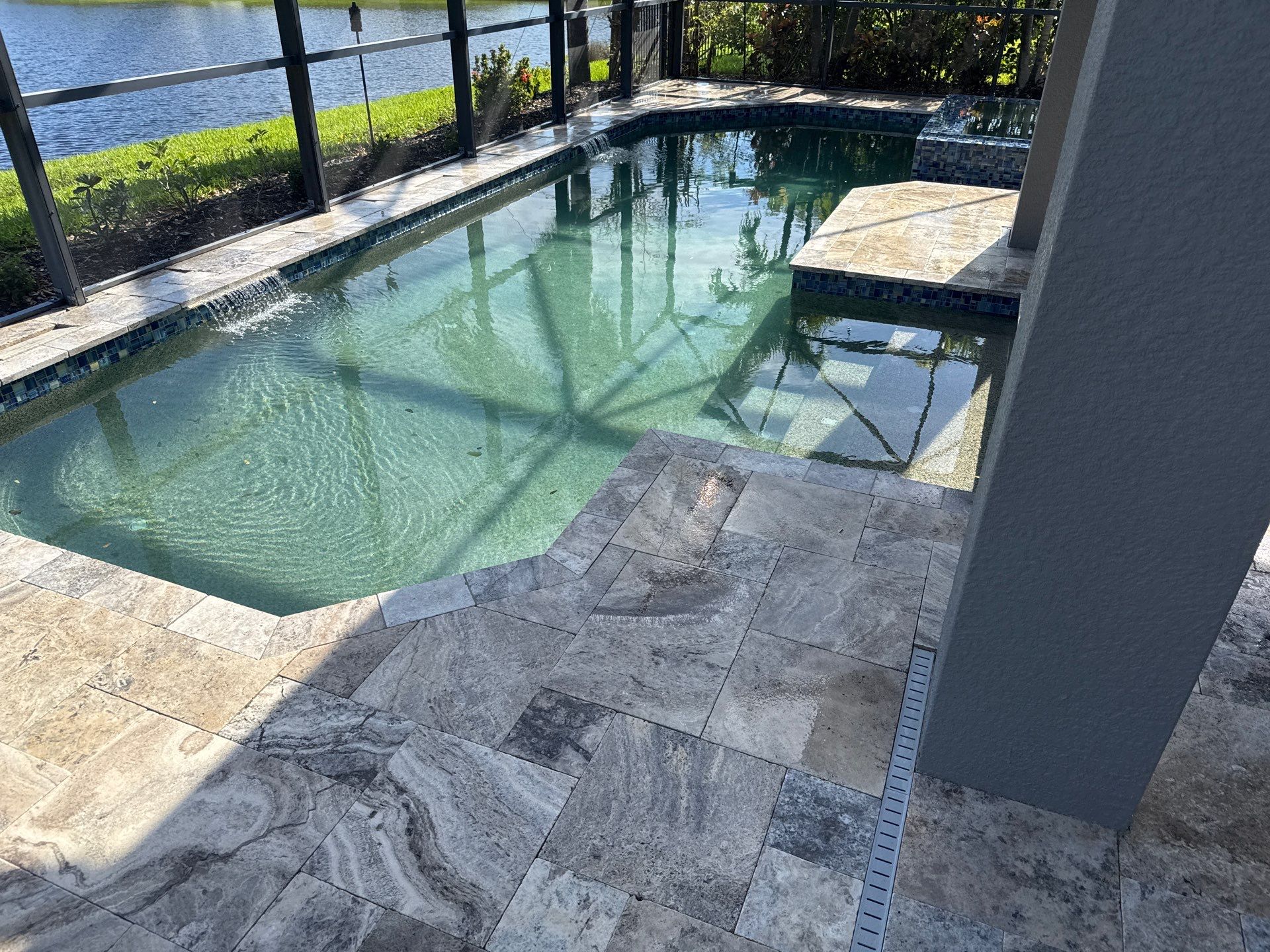 Travertine Pool Deck and Screen Enclosure Cleaning in Ellenton, FL | Oakleaf Hammock Community by Sunshine AquaWash