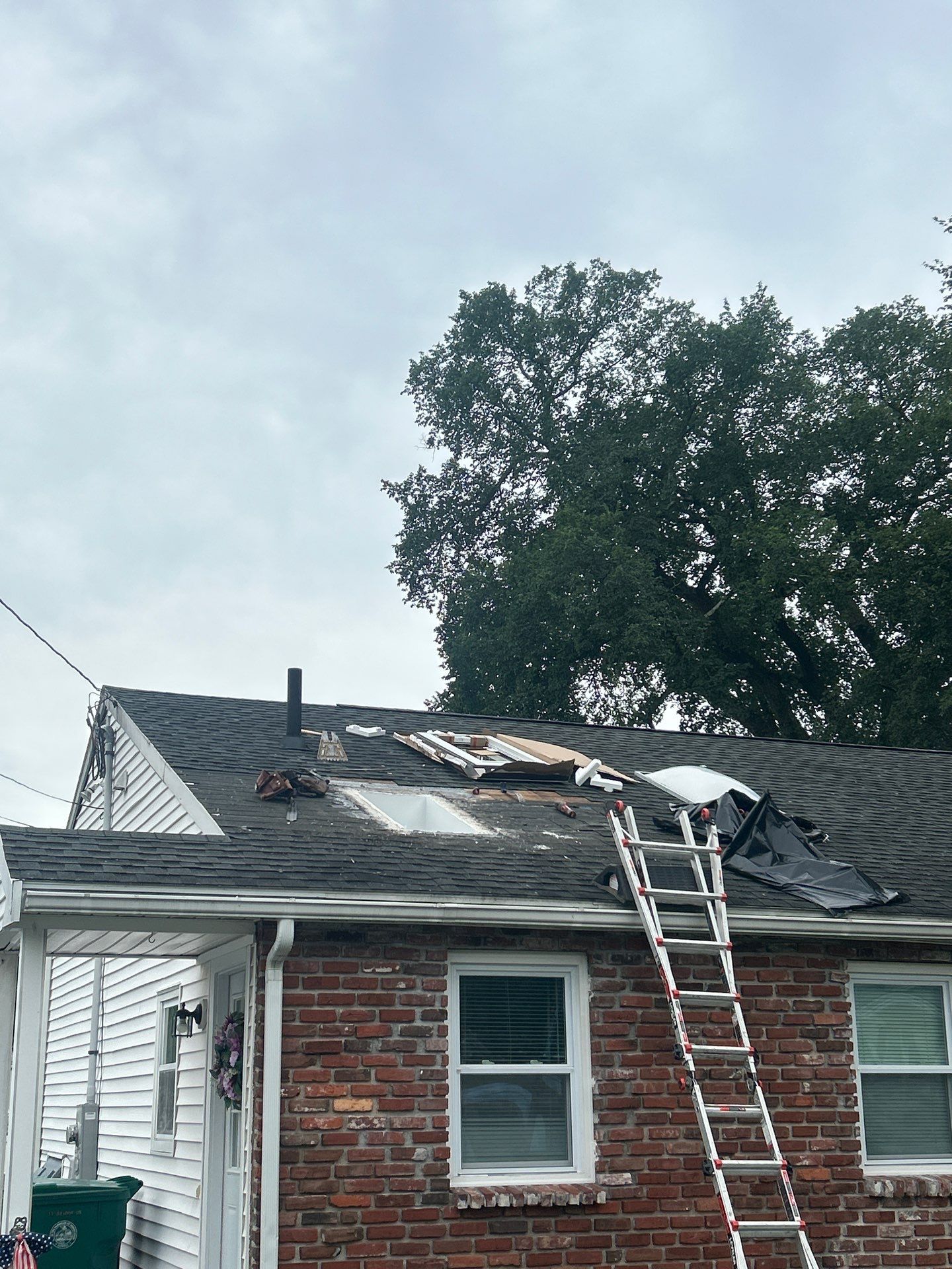 Lowell Premium Velux Curb-Mount Skylight & Chimney Restoration by Mighty Dog Roofing of Greater Middlesex County