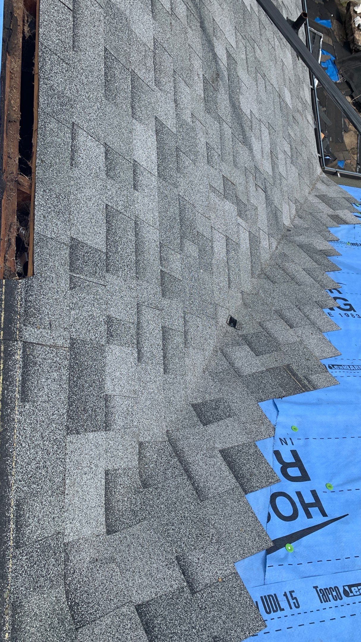Residential Roofing Installation using 50 mil PVC by Hostetler Roofing