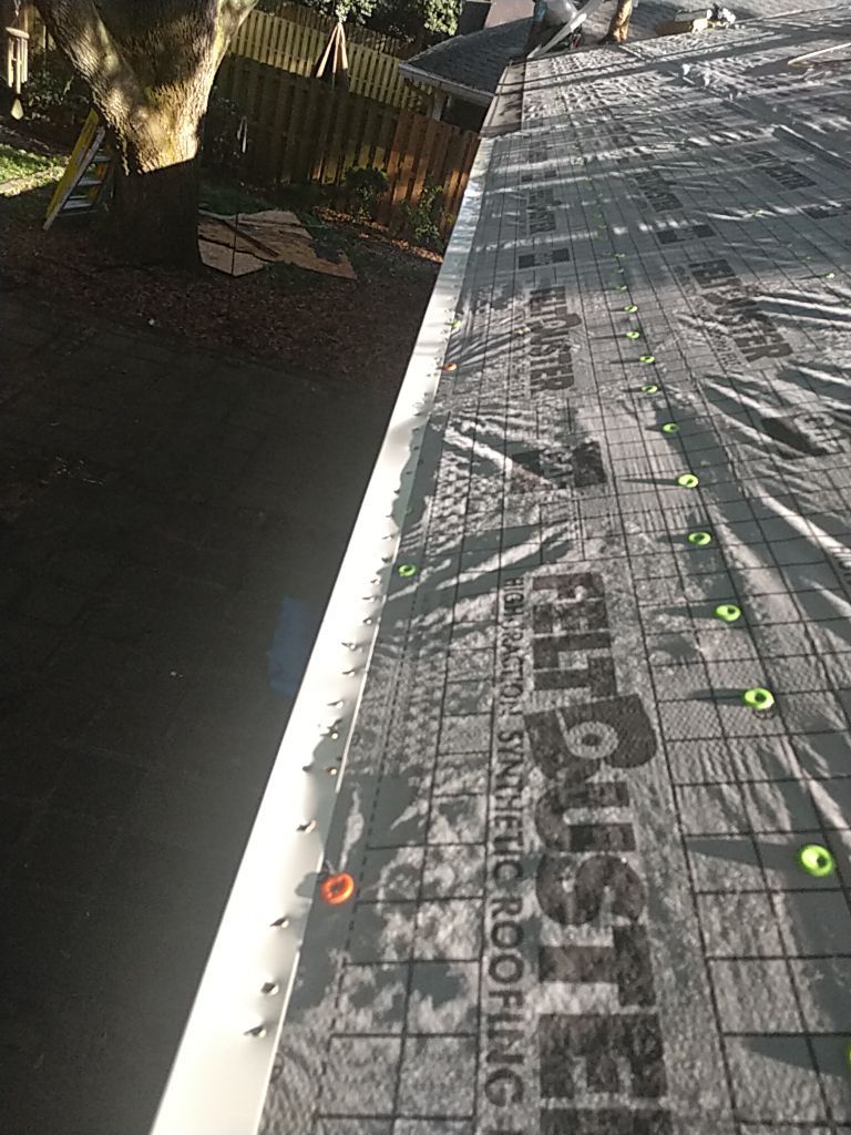 Residential Roofing Installation using Roof Replacement by American Roofing & Construction LLC