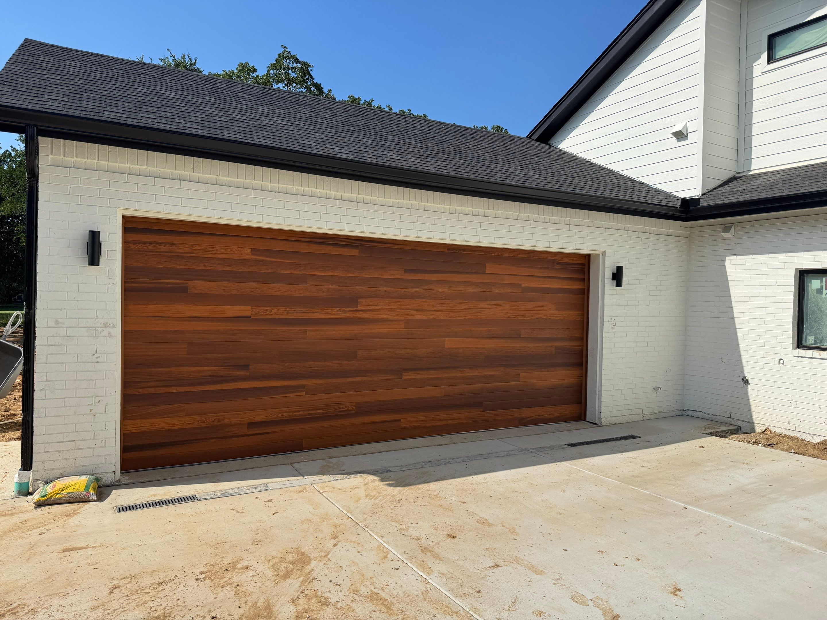 Modern CHI Cedar Garage Door and LiftMaster Opener in Trophy Club by Meadows Garage Doors
