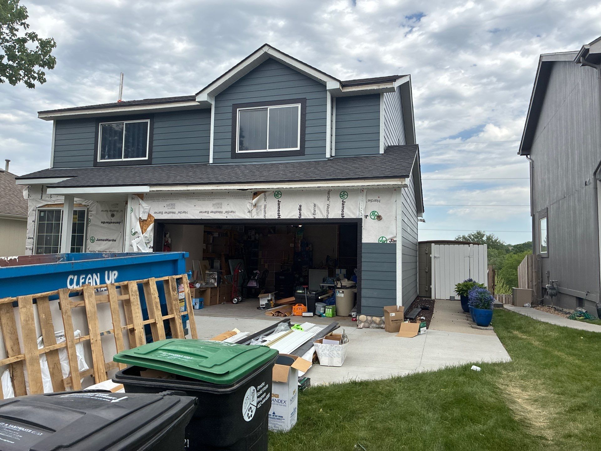 James Hardie Siding and Window Replacement with Arctic White Trim by Carps Complete Exteriors