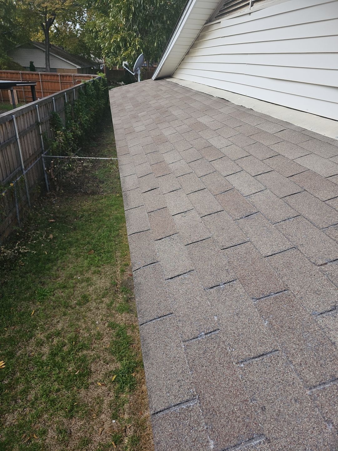 "Full Roof Replacement Due to Hail and Water Damage – Before & After" by road roofing llc