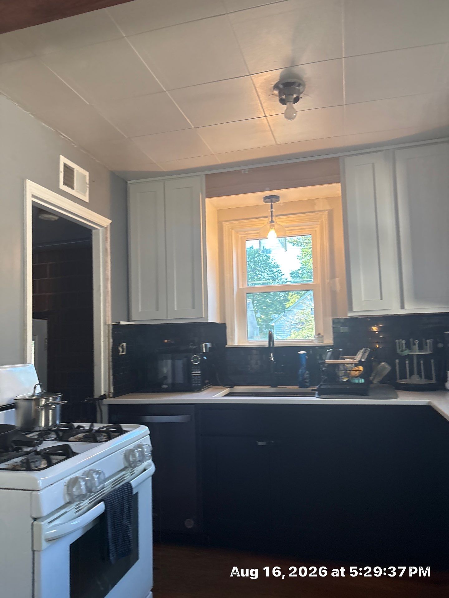 Modern Two-Tone Kitchen Remodel With Quartz Countertops in Lincoln by CompanyCam Sales Demo