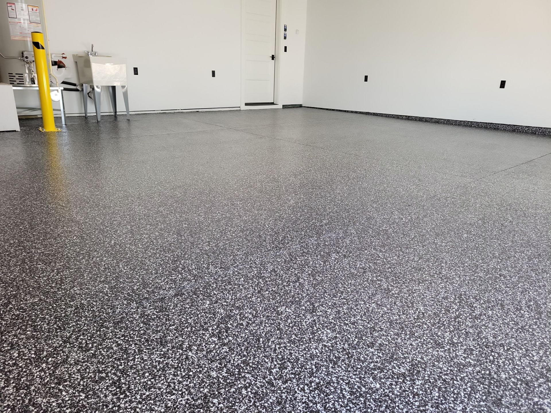 Garage Transformation using Raven by Croc Coatings, LLC