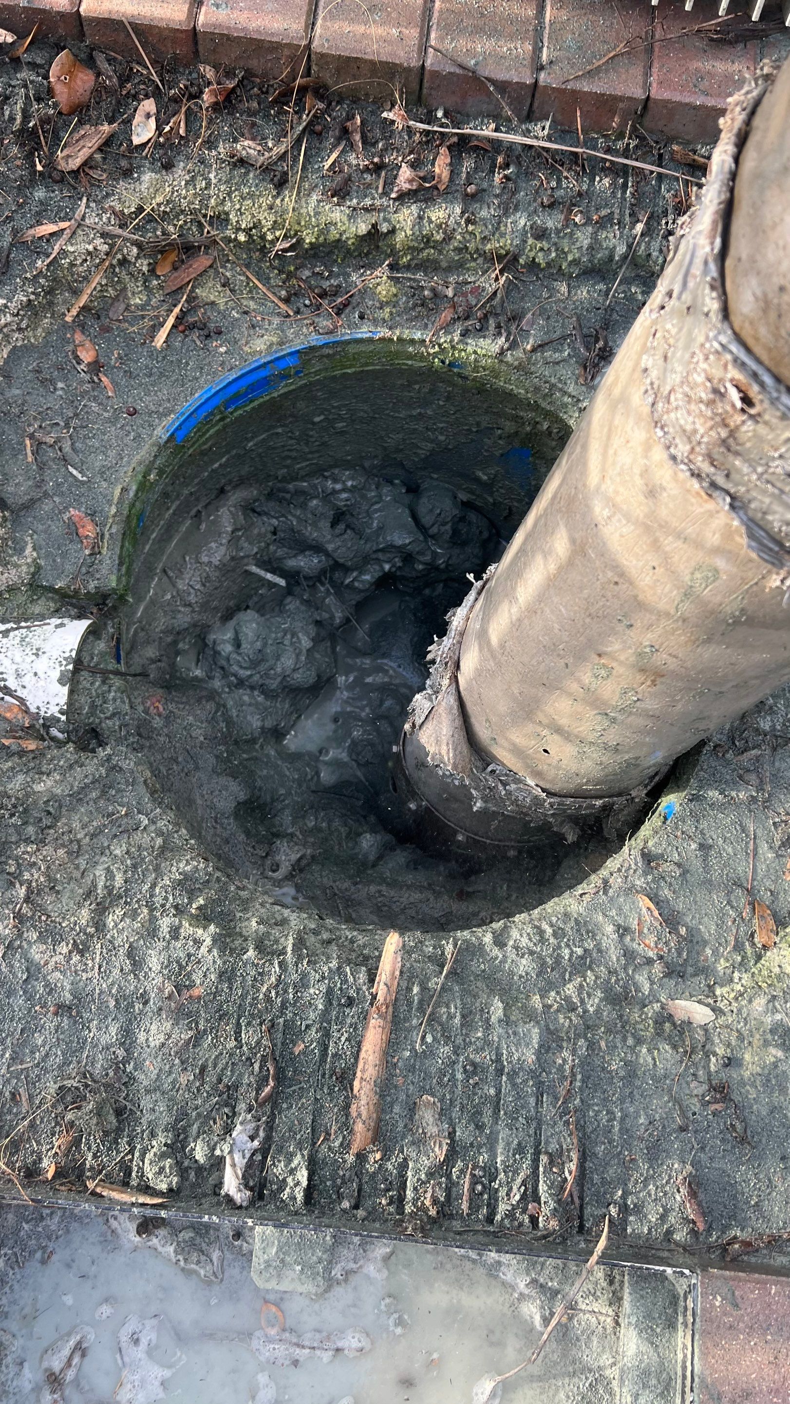 Pelican Landing Tennis Court Catch Basin Cleaning by APS Power & Water